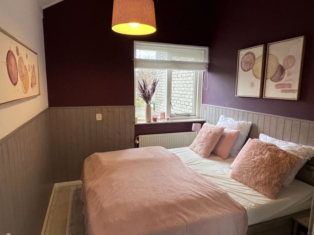 Een slaapkamer van 395671 in Julianadorp Niederlande