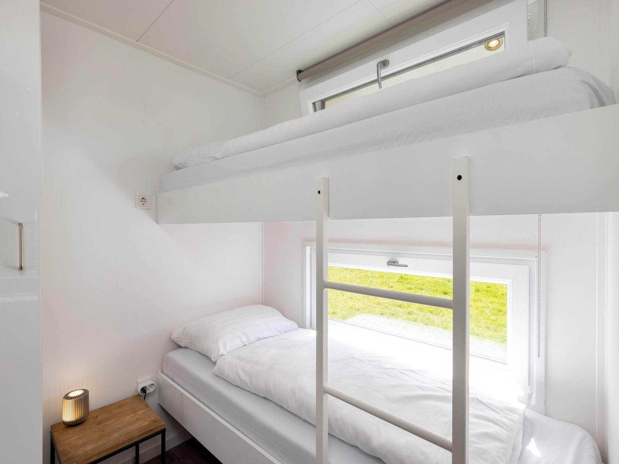 Een slaapkamer van Recreatiepark Tolplas 18 in Hoge Hexel