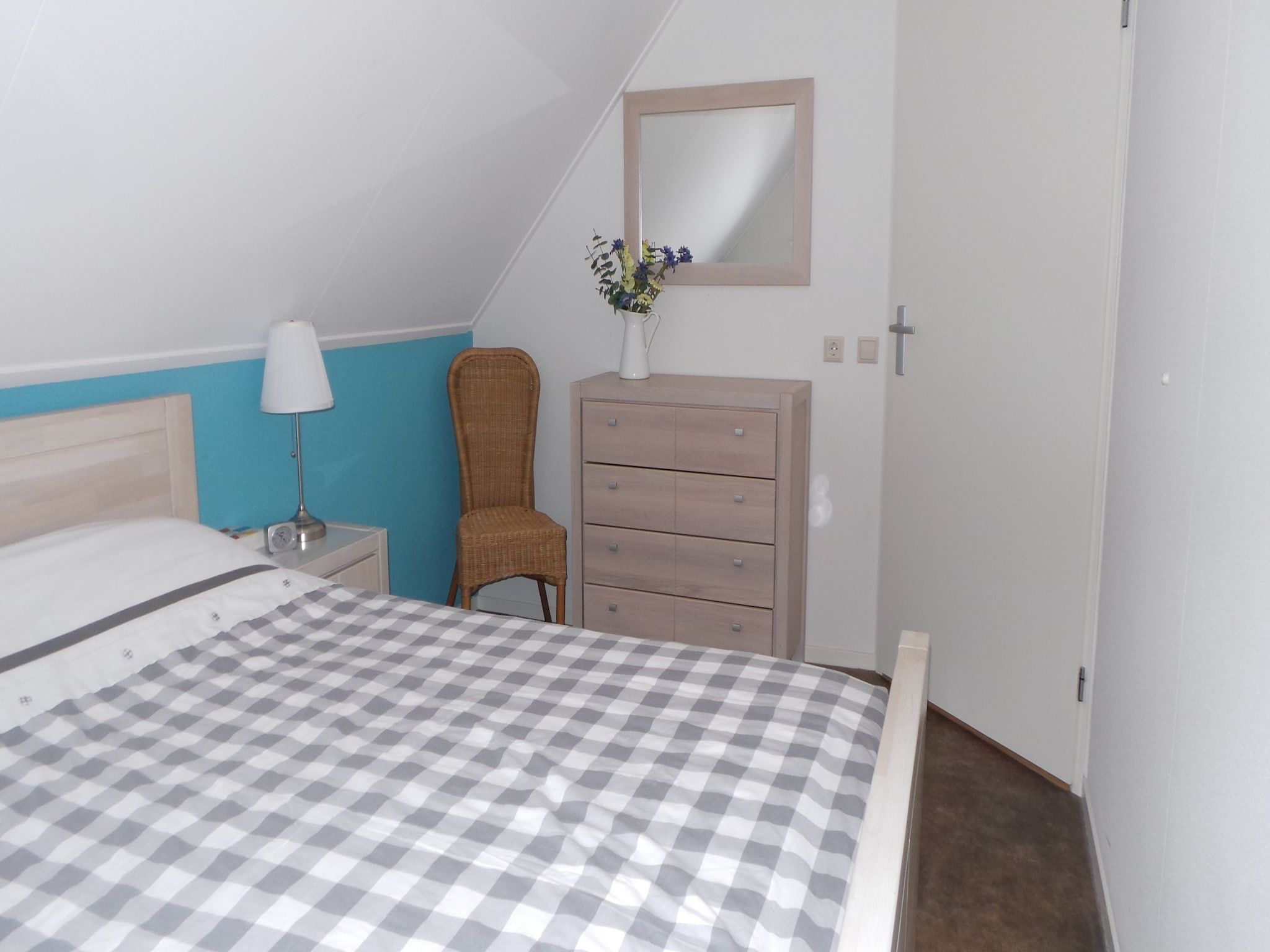 Een slaapkamer van Buitenplaats Berg en Bos nummer 15 in Lemele