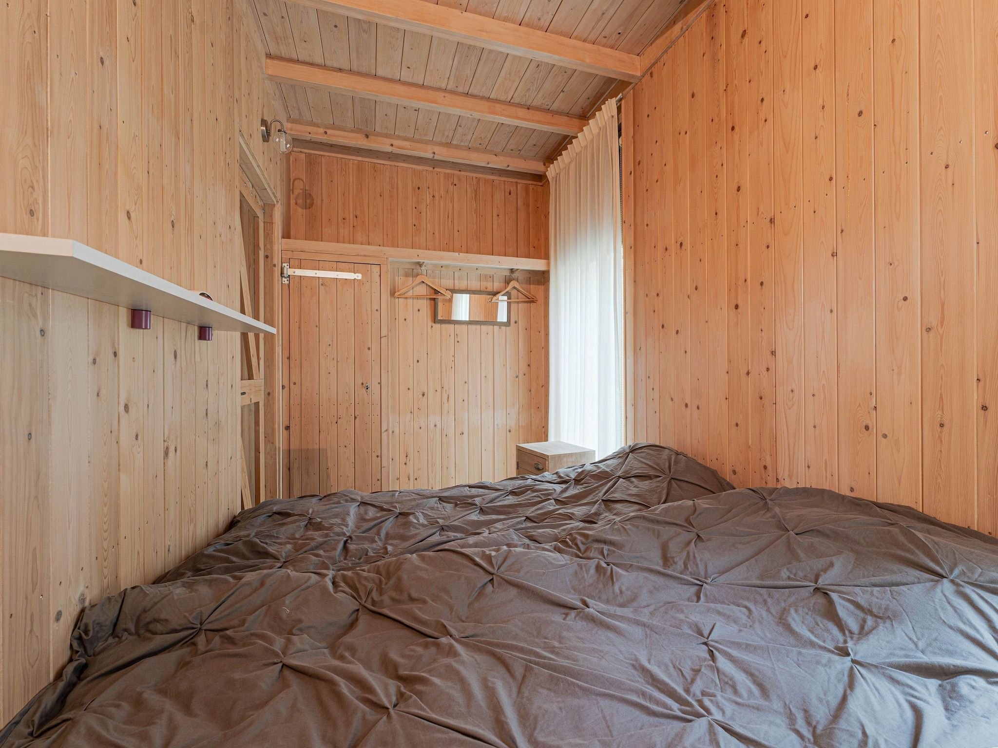 Een slaapkamer van Boshuis De Klim in Norg