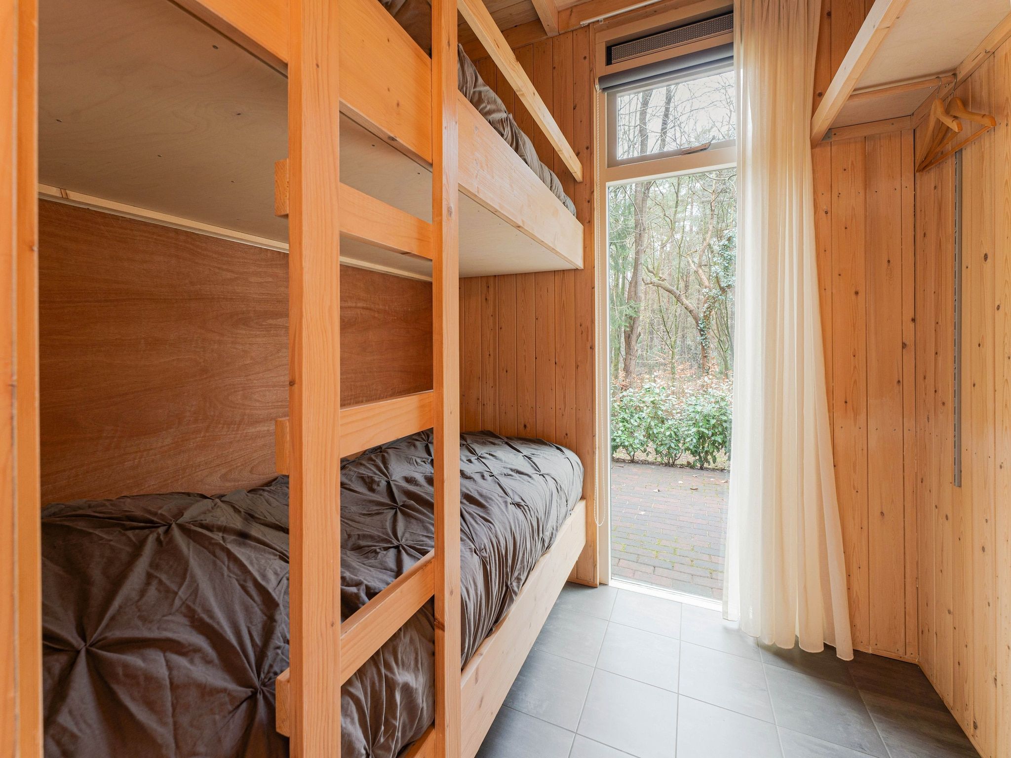 Een slaapkamer van Boshuis De Klim in Norg