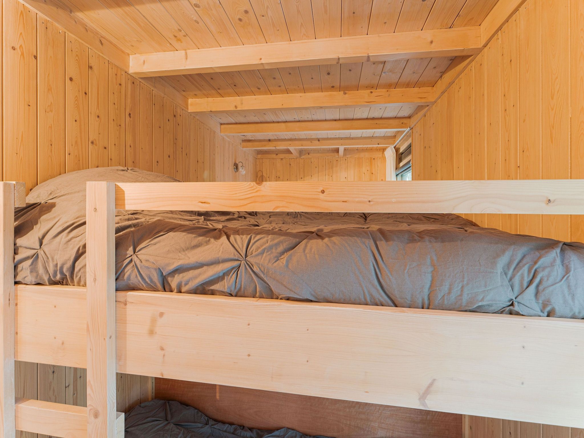 Een slaapkamer van Boshuis De Klim in Norg