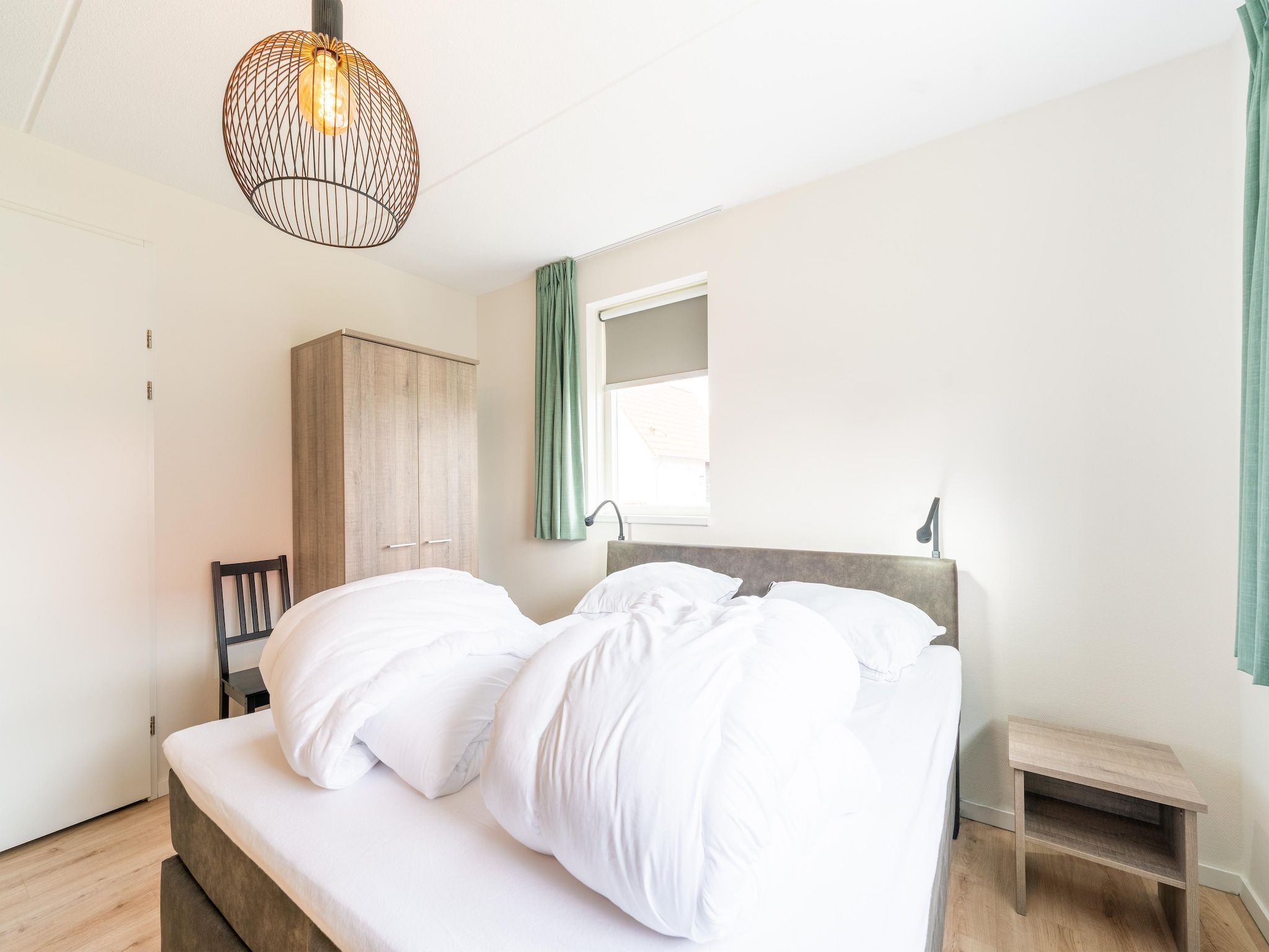 Een slaapkamer van De Botter Huis Nr 15 in Scherpenisse