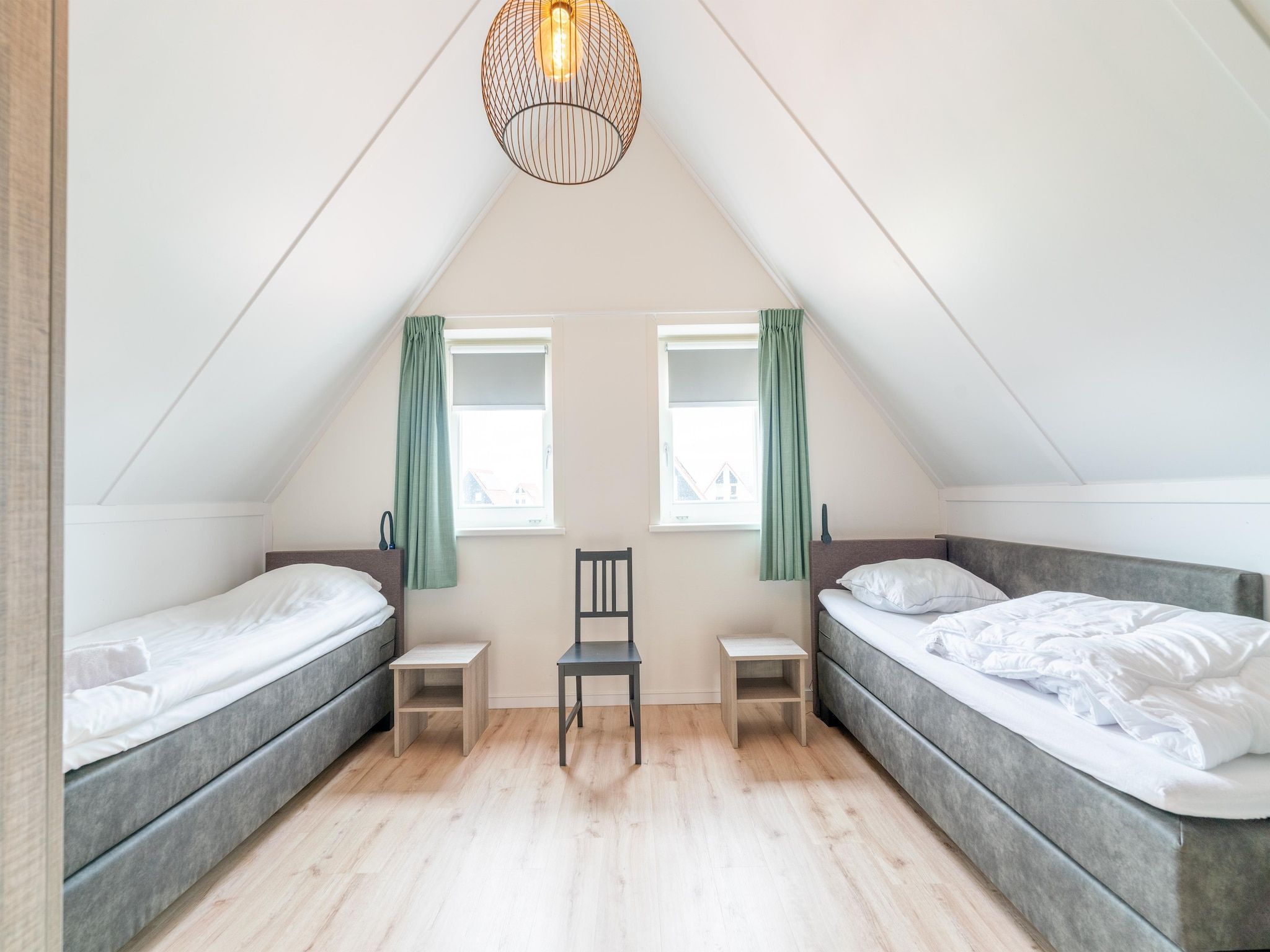 Een slaapkamer van De Botter Huis Nr 15 in Scherpenisse