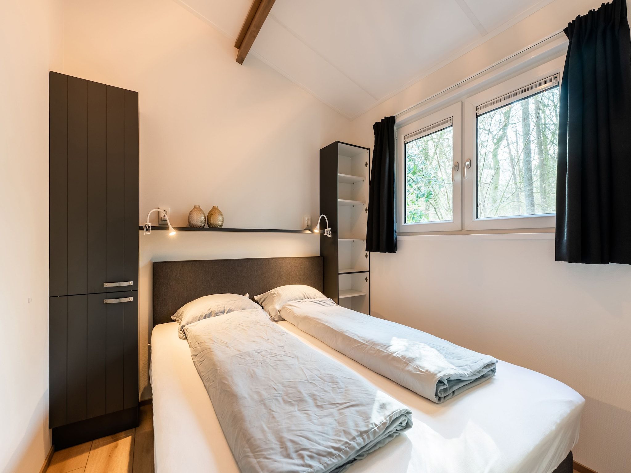 Een slaapkamer van De Hooischuur in Hellendoorn in Hellendoorn