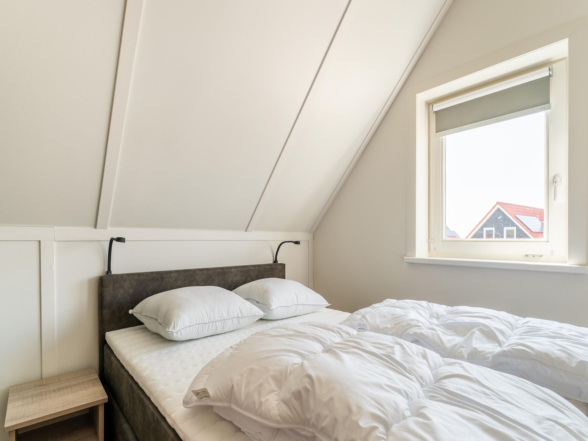 Een slaapkamer van De Tjiftjaf Huis Nr 21 in Scherpenisse