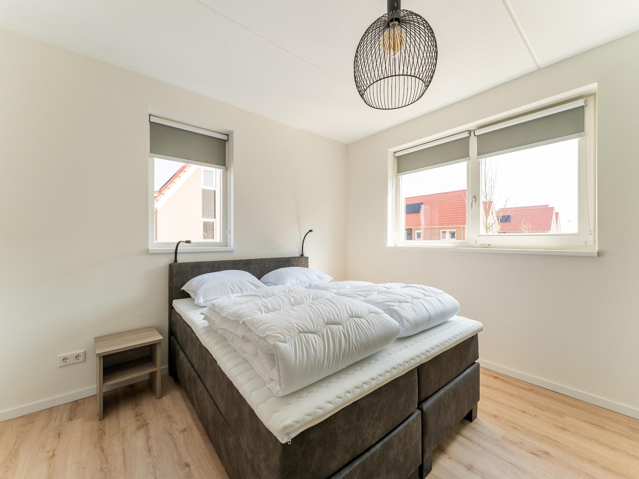 Een slaapkamer van De Tjiftjaf Huis Nr 21 in Scherpenisse
