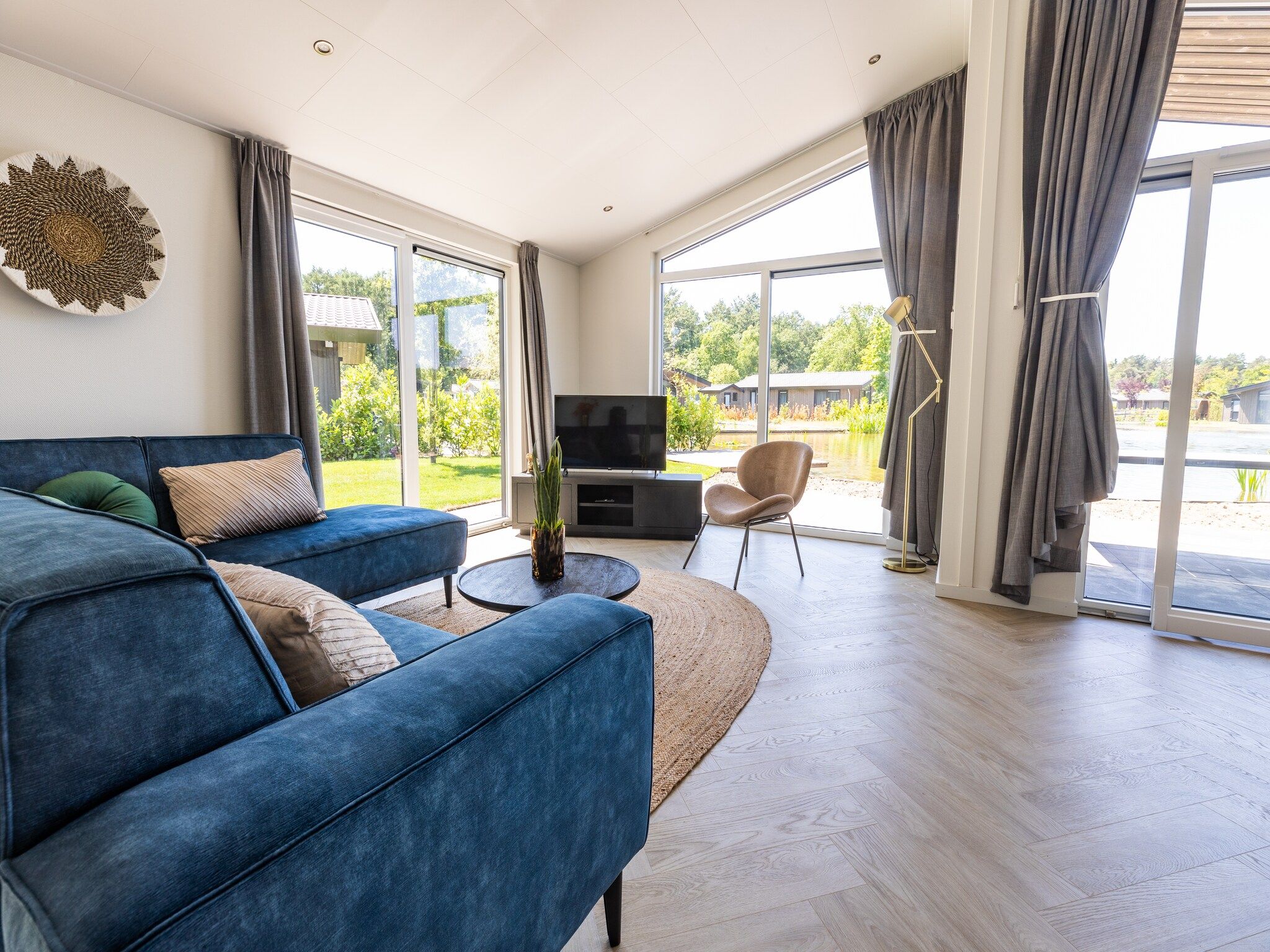 De woonkamer van Vakantiepark Molenvelden 3 in Veldhoven
