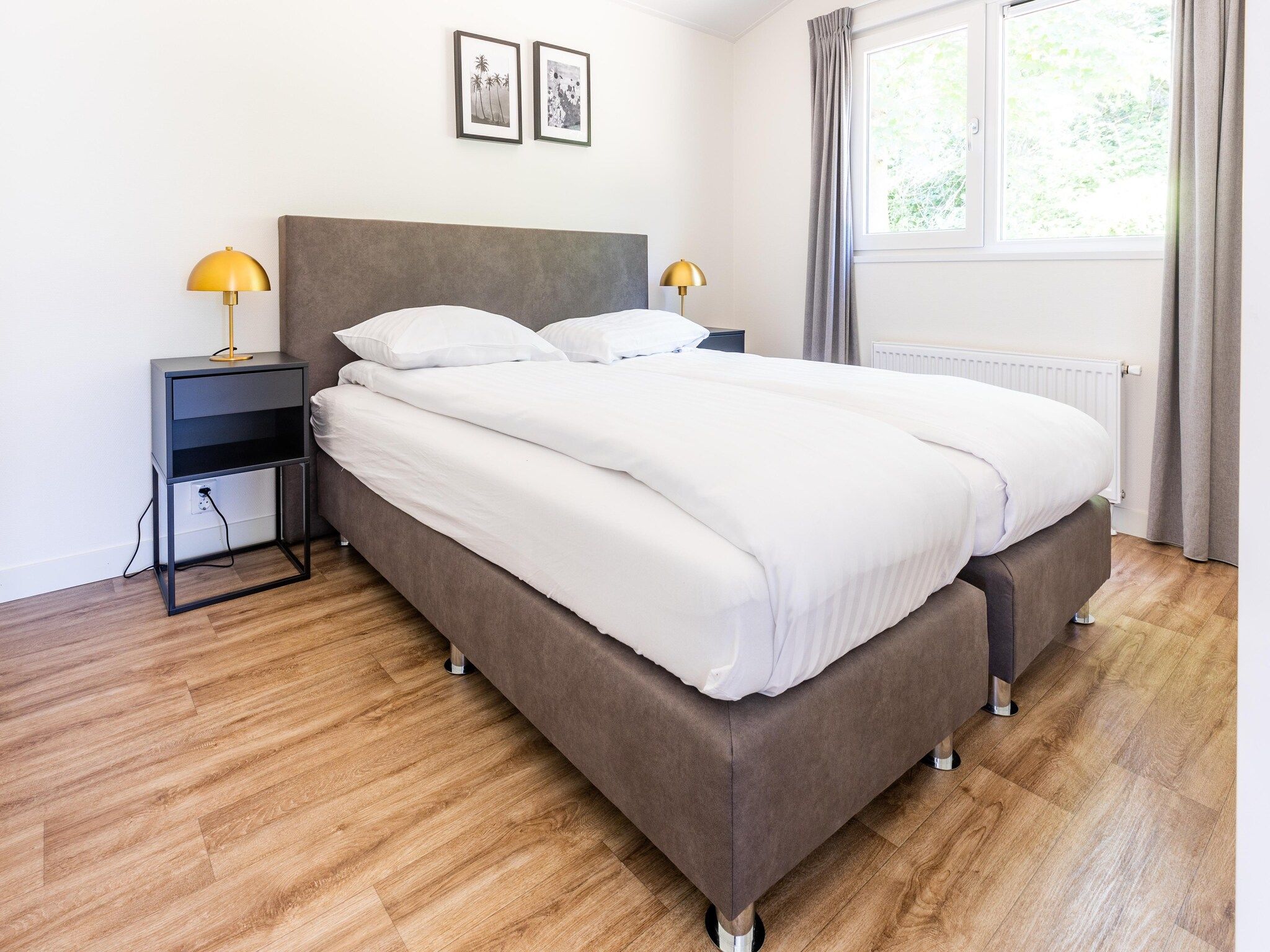 Een slaapkamer van Vakantiepark Molenvelden 6 in Veldhoven