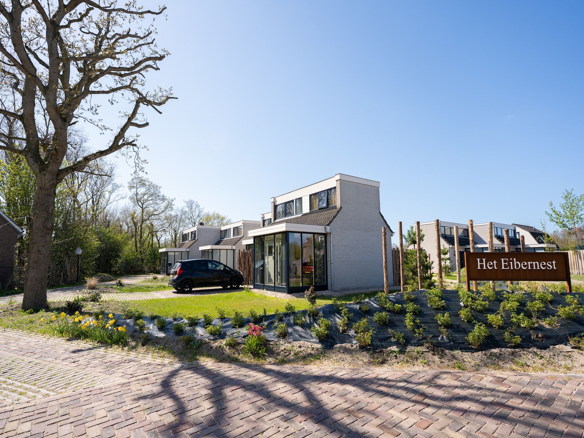 De buitenkant van Vakantiepark 't Eibernest Texel 2 in De Cocksdorp