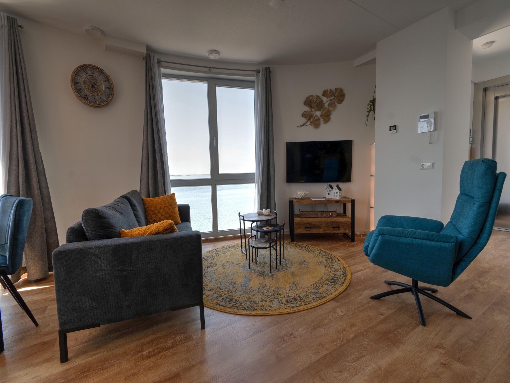 De woonkamer van Casa Isla Bella in Scherpenisse