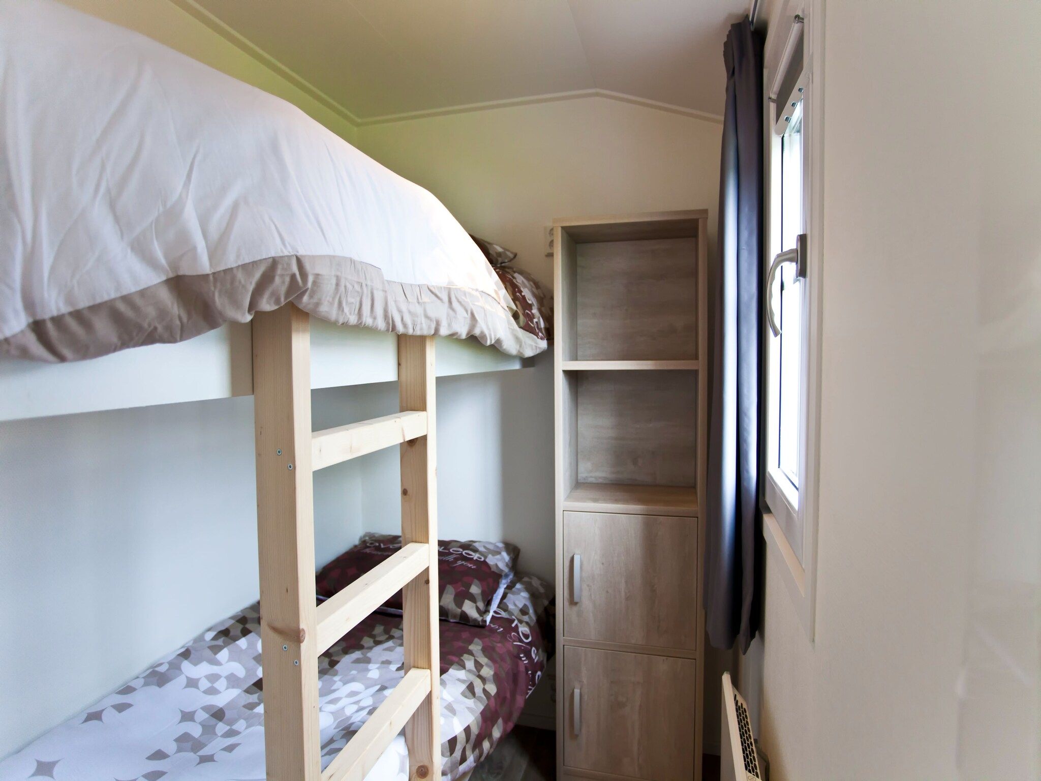 Een slaapkamer van Exclusif Plus 6 in Breskens