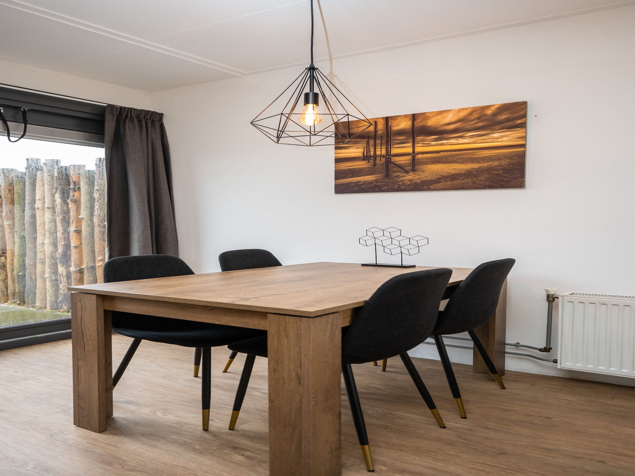 De woonkamer van Vakantiepark 't Eibernest Texel 6 in De Cocksdorp