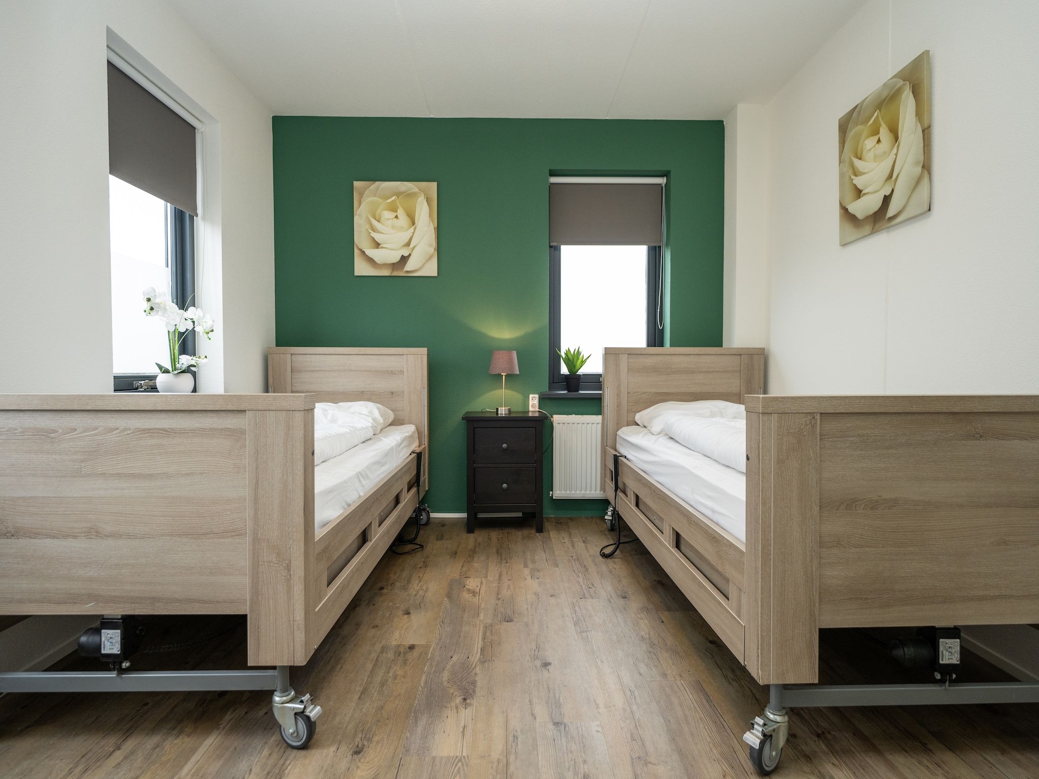 Een slaapkamer van Vakantiepark 't Eibernest Texel 7 in De Cocksdorp