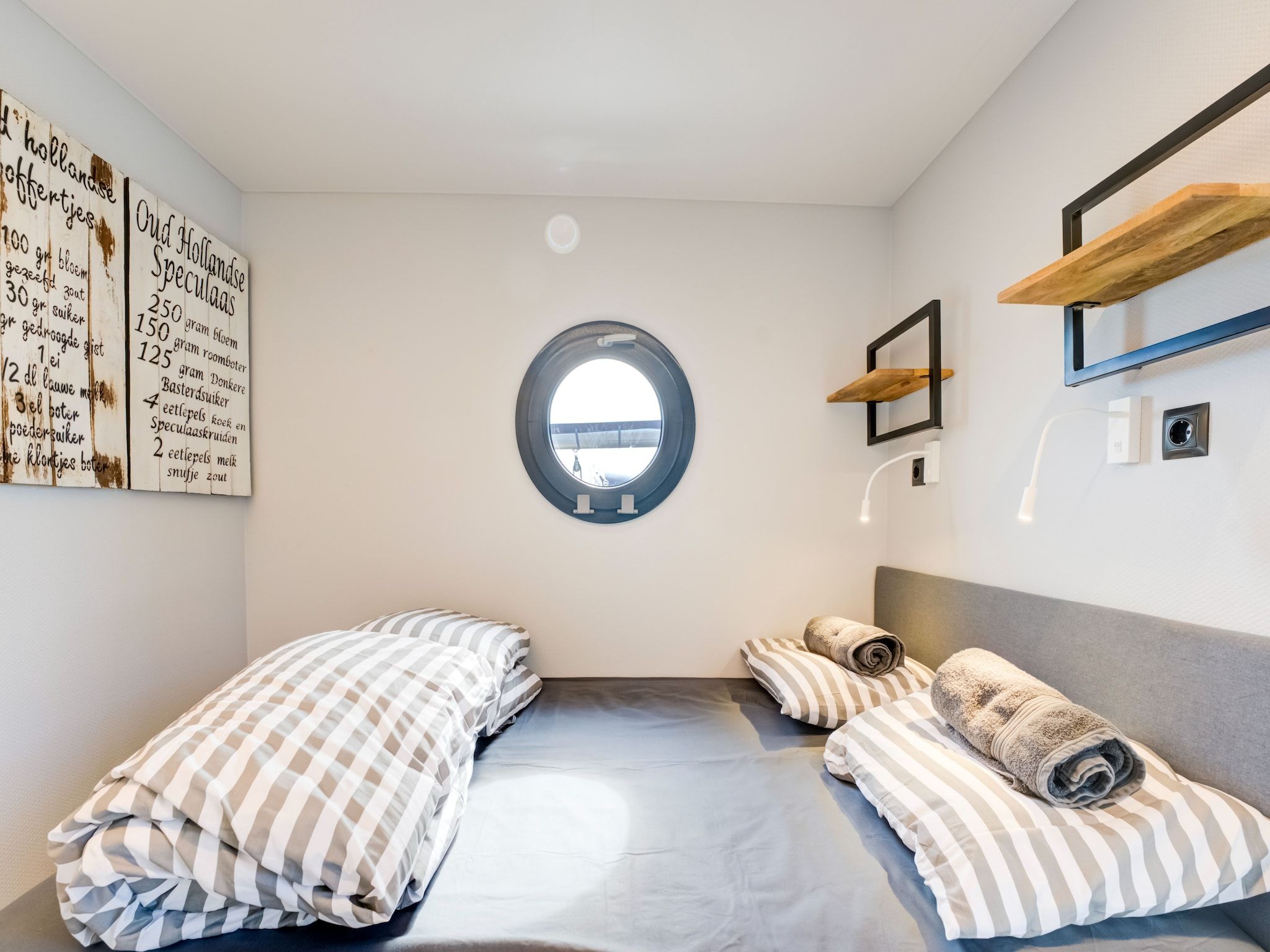 Een slaapkamer van La Belle Vie in Volendam