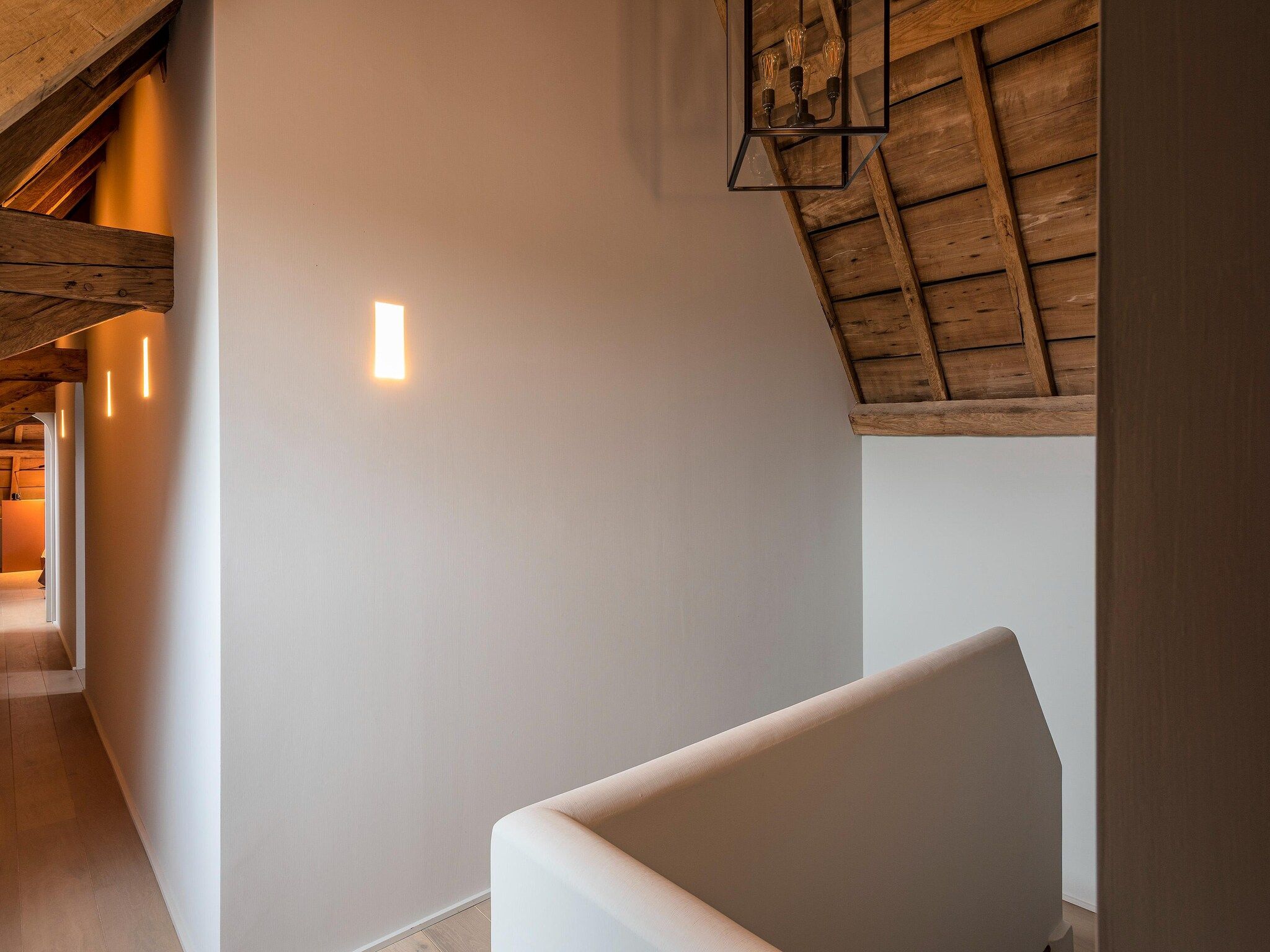 Een slaapkamer van Herenhoeve de Bockhof in Schimmert