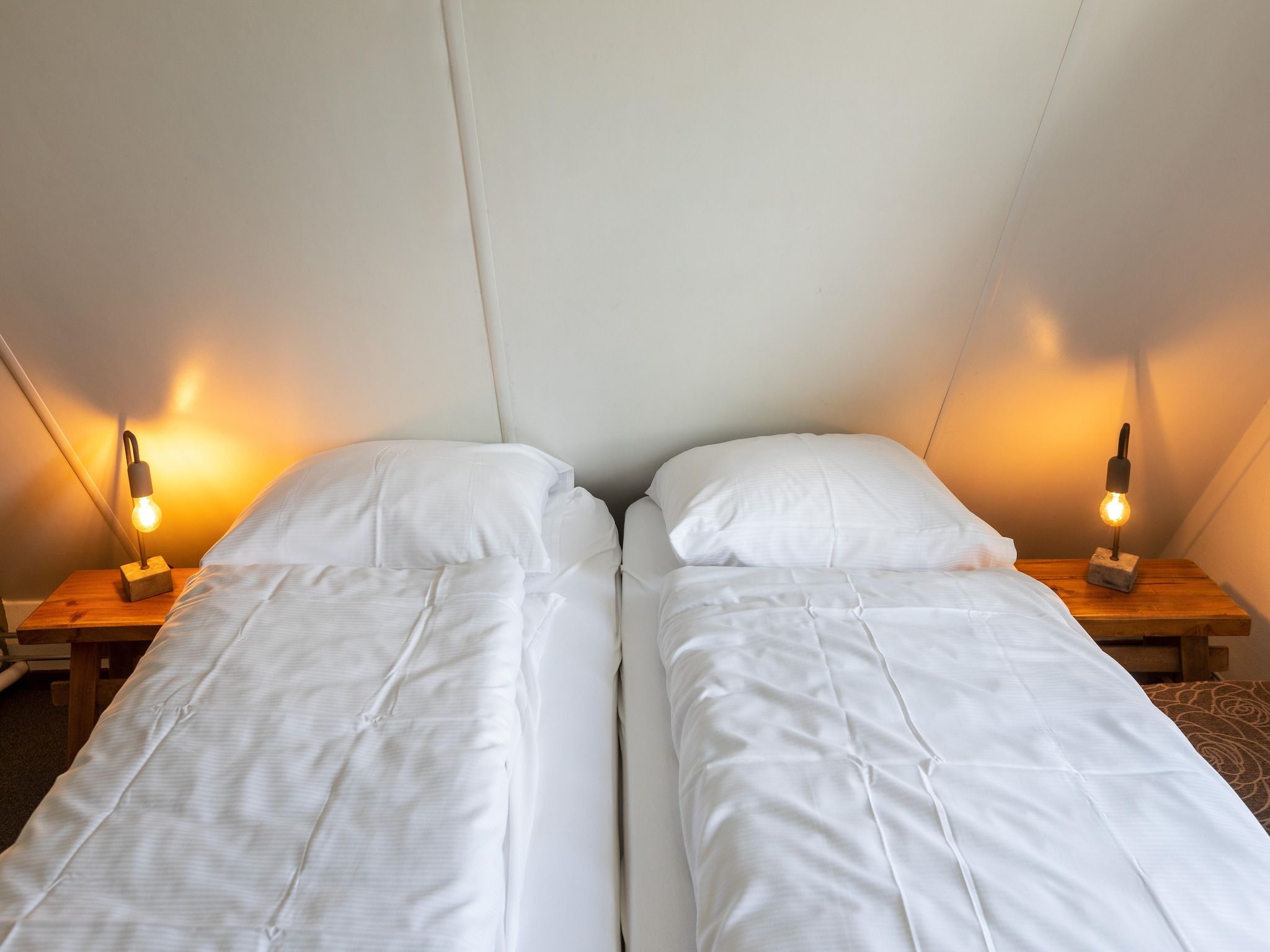 Een slaapkamer van Vakantie bij Meeussen - Molendal 2 in Plasmolen
