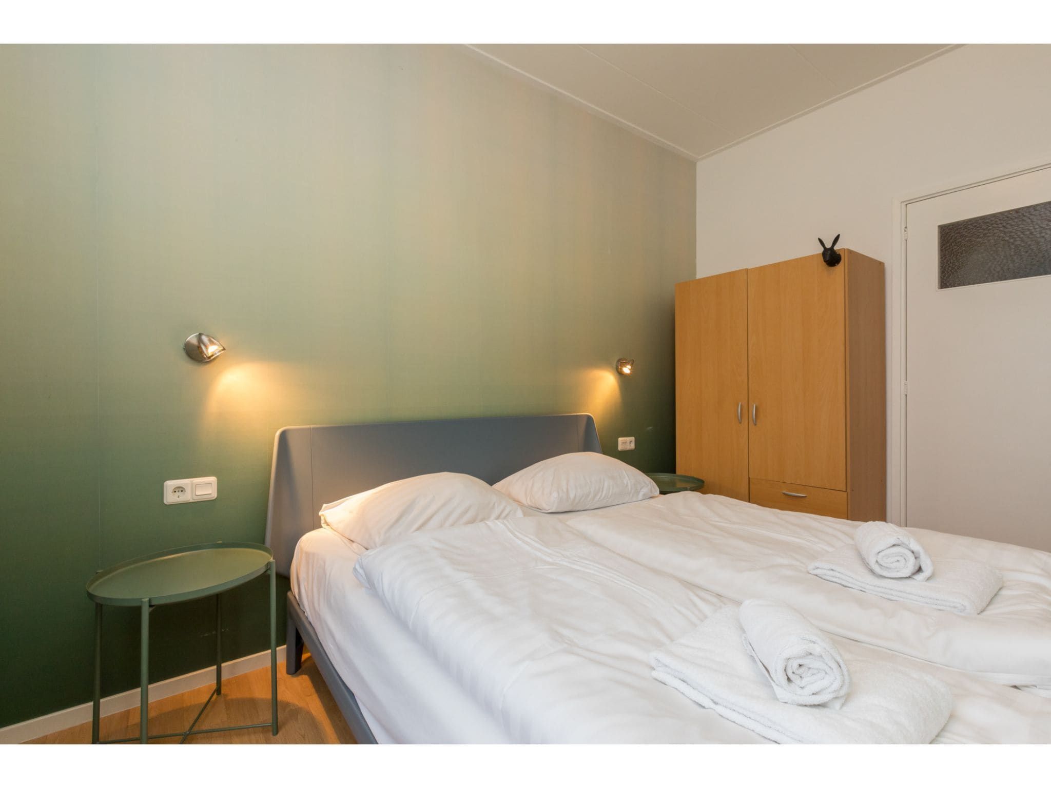 Een slaapkamer van Appartement - Kon Emmaweg 6  beneden app in Vrouwenpolder