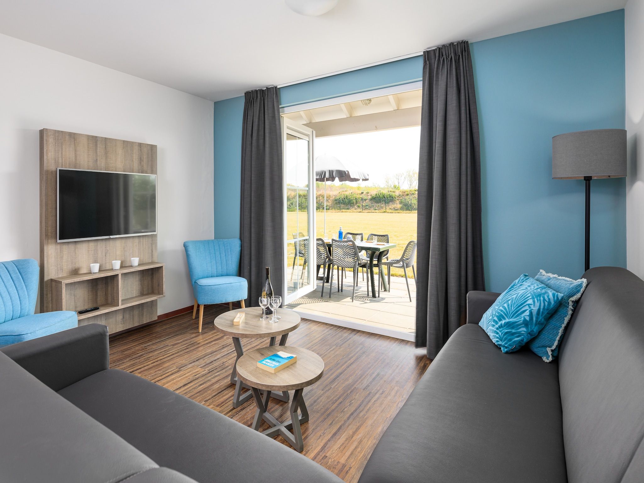 De woonkamer van Vakantiepark Klein Vink 9 in Arcen