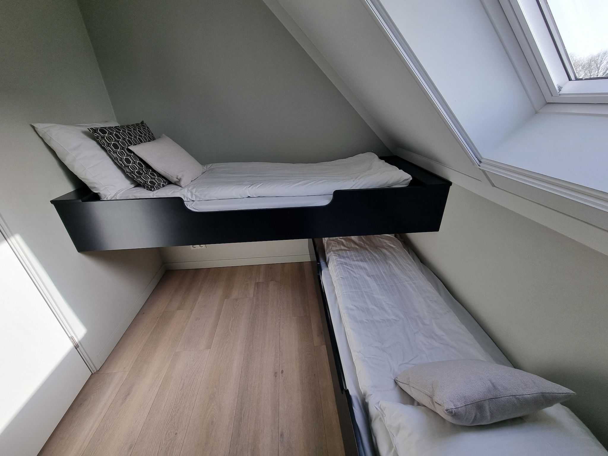 Een slaapkamer van Watervilla Twa in Balk