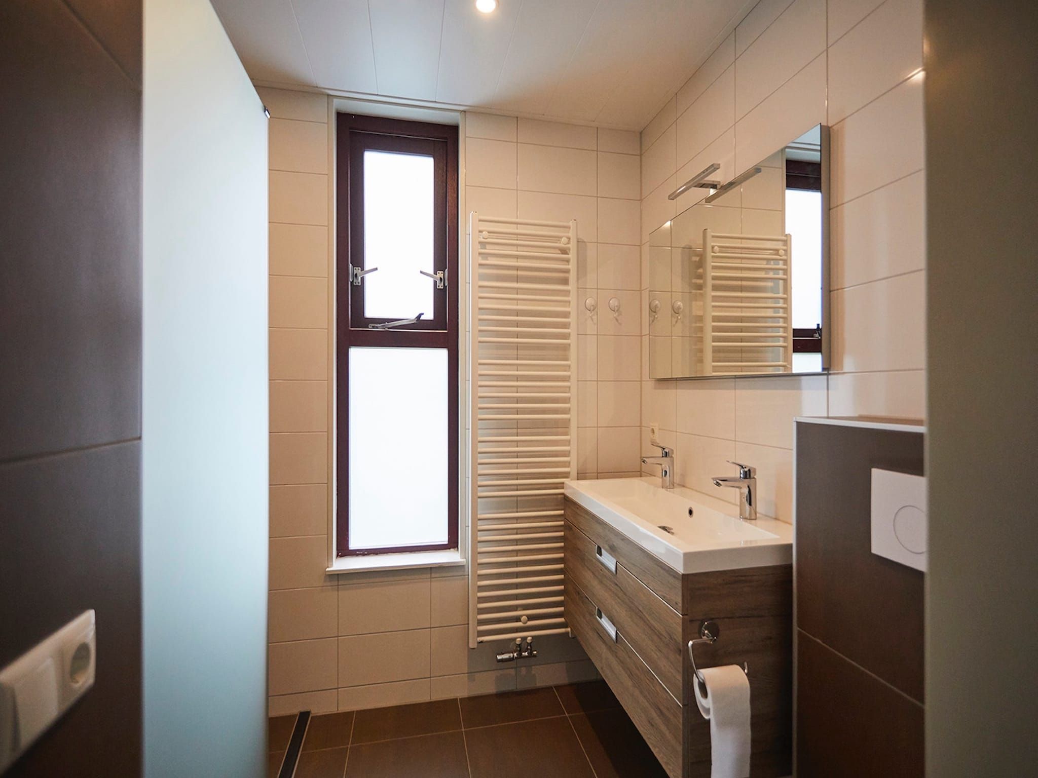 De badkamer van Vakantiepark Hof van Zeeland 4 in Heinkenszand