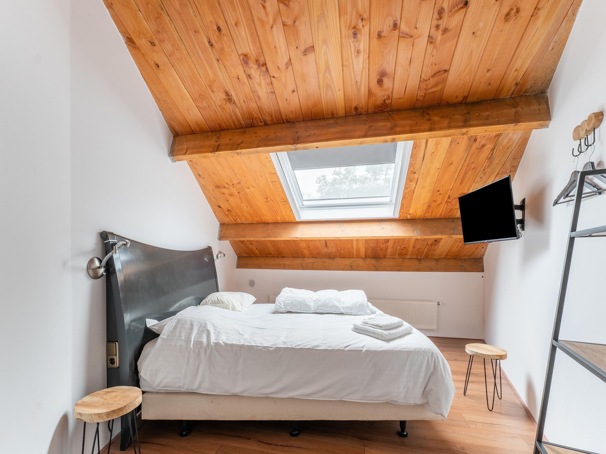 Een slaapkamer van NR 5 in Goirle
