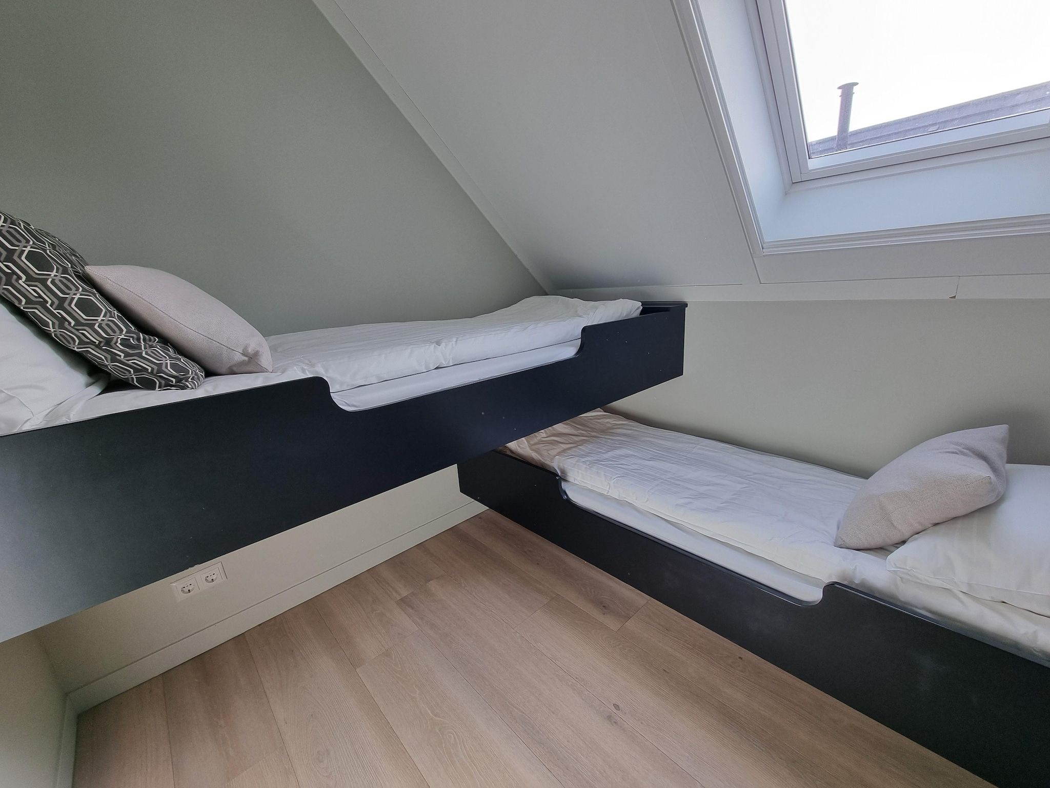 Een slaapkamer van Watervilla San in Balk