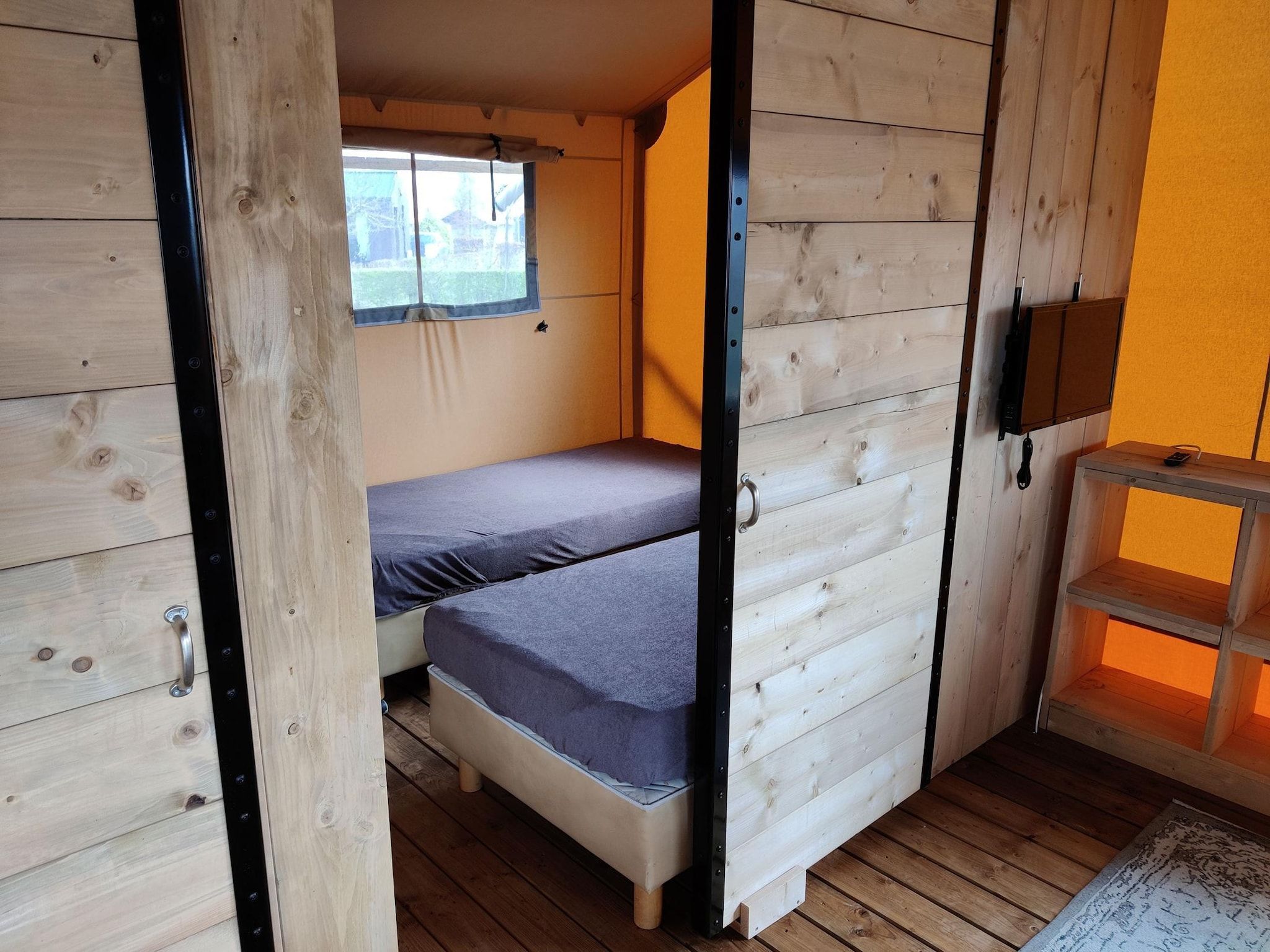 Een slaapkamer van Vakantiepark Eigen Wijze 10 in Bant