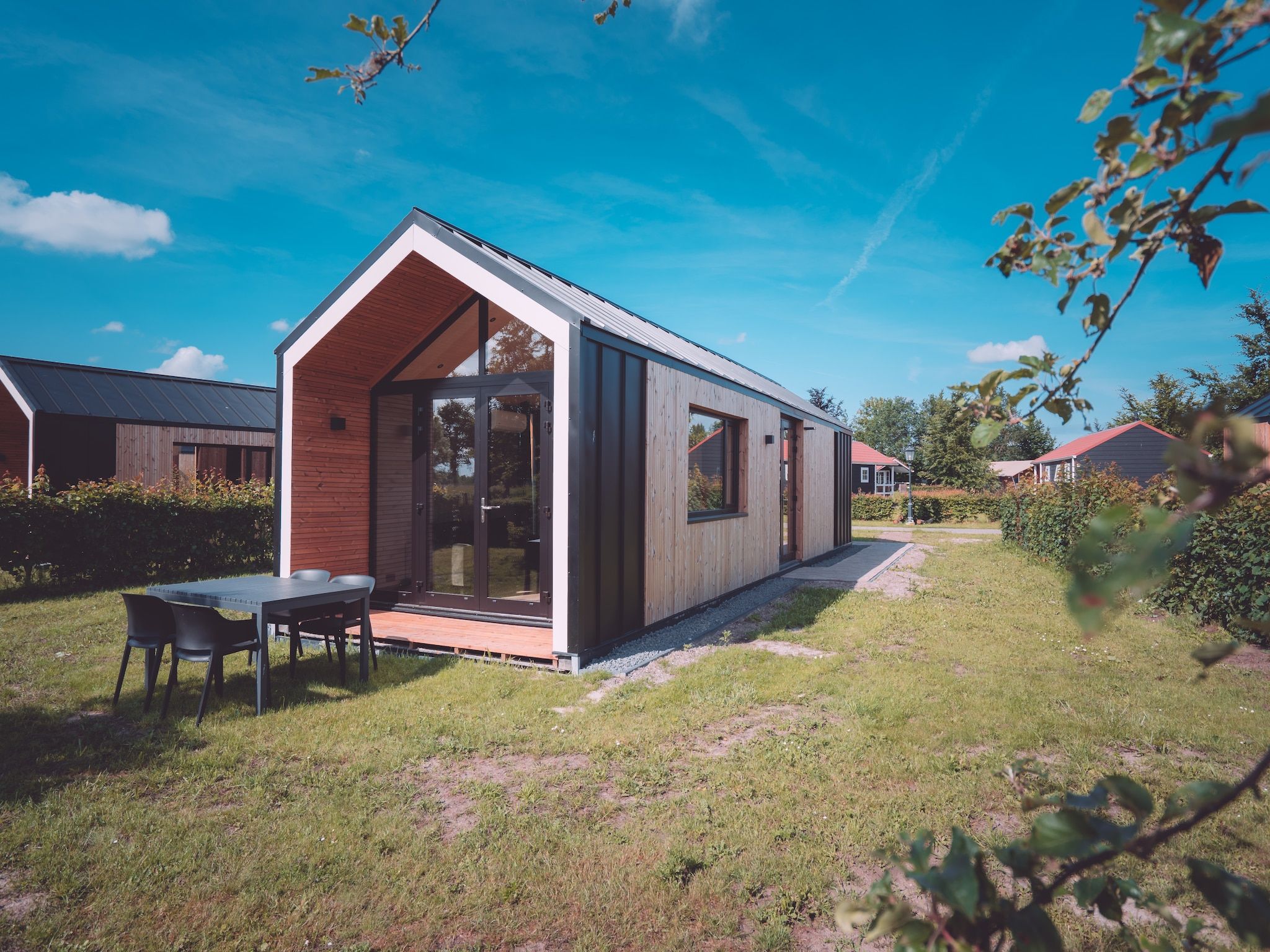 De tuin van Vakantiepark Eigen Wijze 12 in Bant