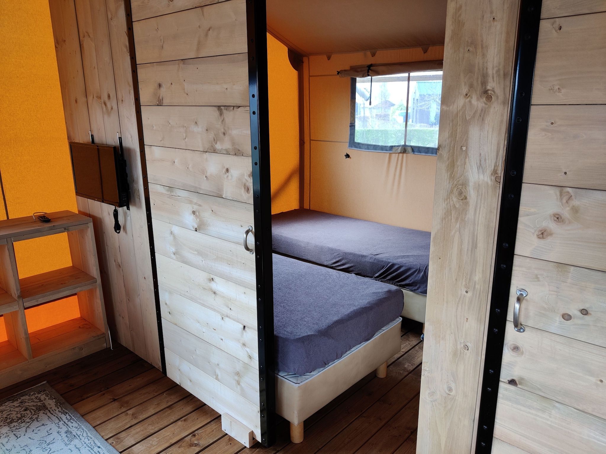 Een slaapkamer van Vakantiepark Eigen Wijze 13 in Bant