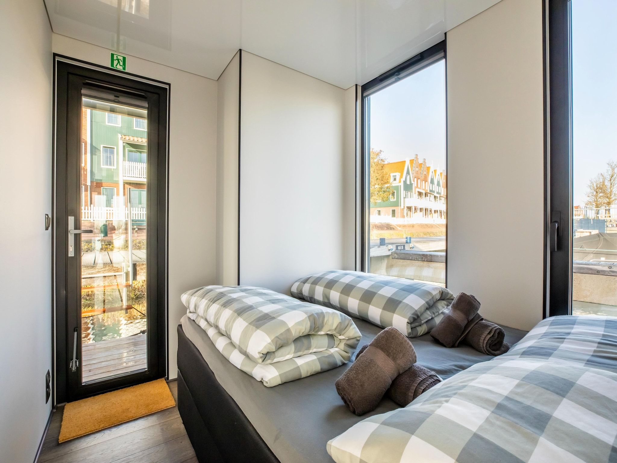 Een slaapkamer van Marina Sunrise in Volendam