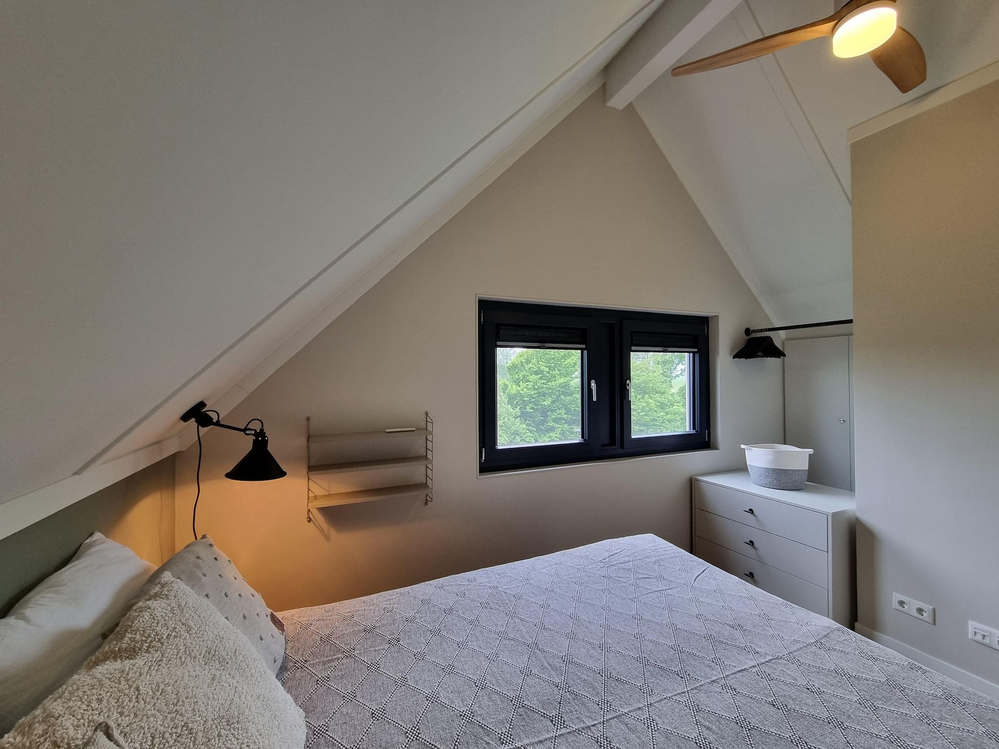 Een slaapkamer van Watervilla Fiiftjin in Balk