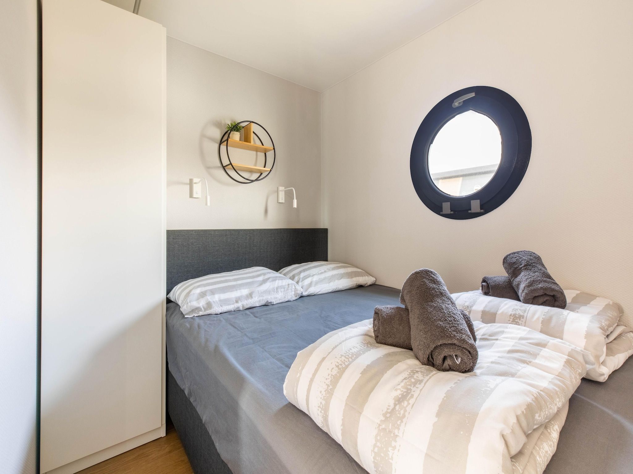 Een slaapkamer van Wave in Volendam