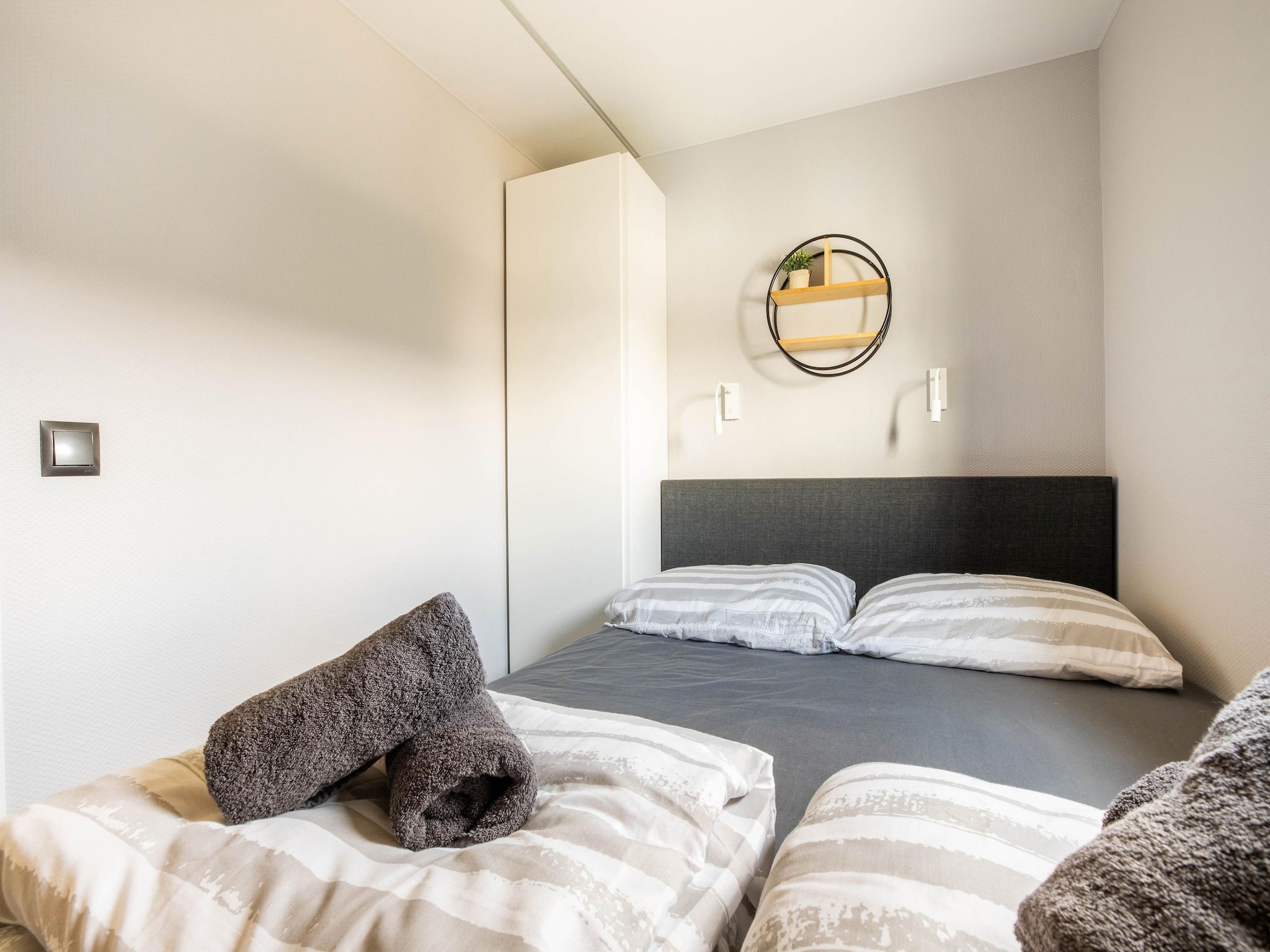 Een slaapkamer van Wave in Volendam