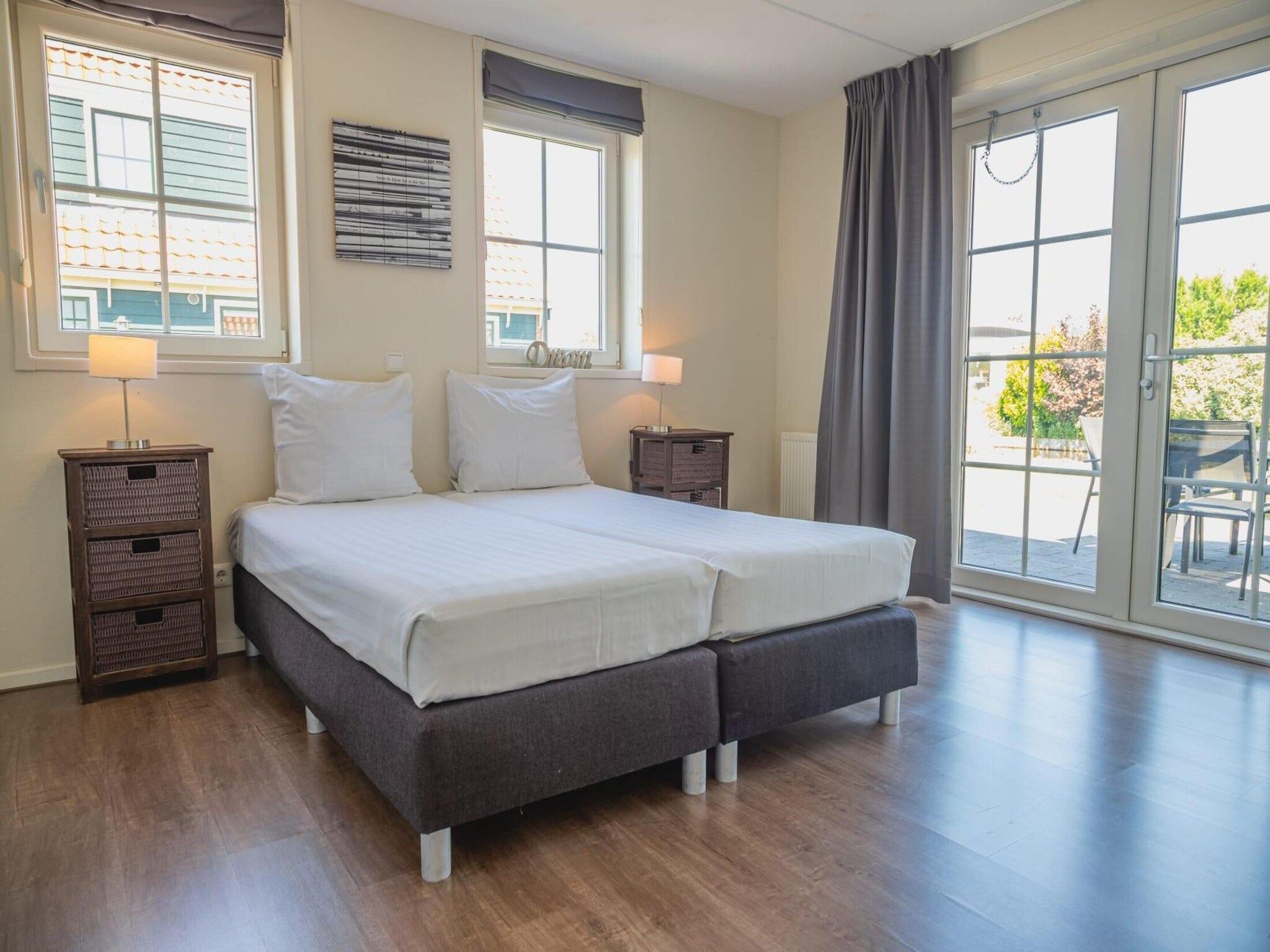 Een slaapkamer van 	De Rijp met Sauna  6 personen in West-Graftdijk