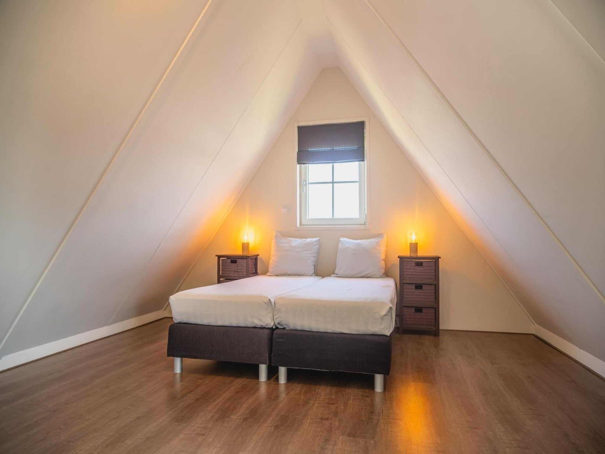 Een slaapkamer van 	De Rijp met Sauna  6 personen in West-Graftdijk