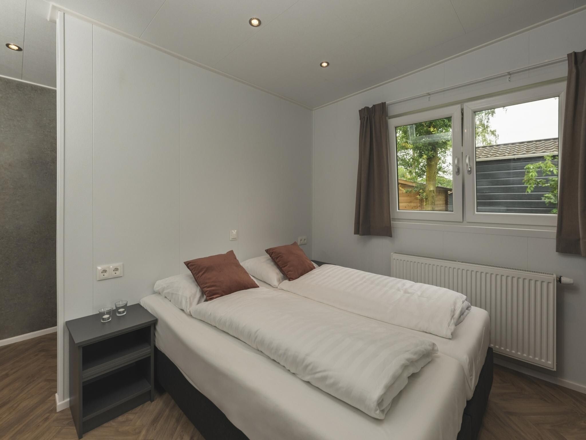 Een slaapkamer van Vakantiepark Mölke 30 in Zuna