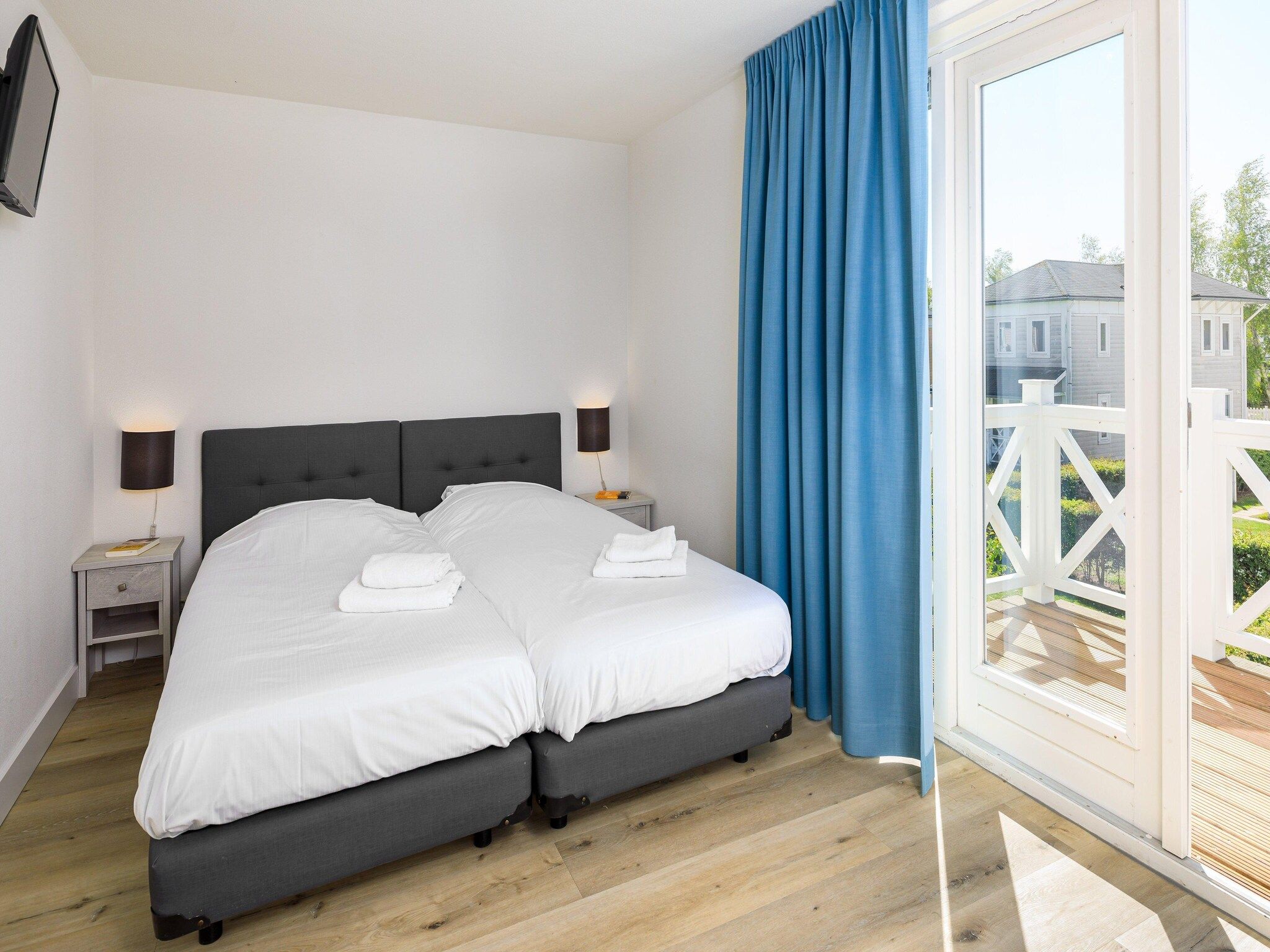 Een slaapkamer van Vakantiepark Cape Helius 24 in Hellevoetsluis