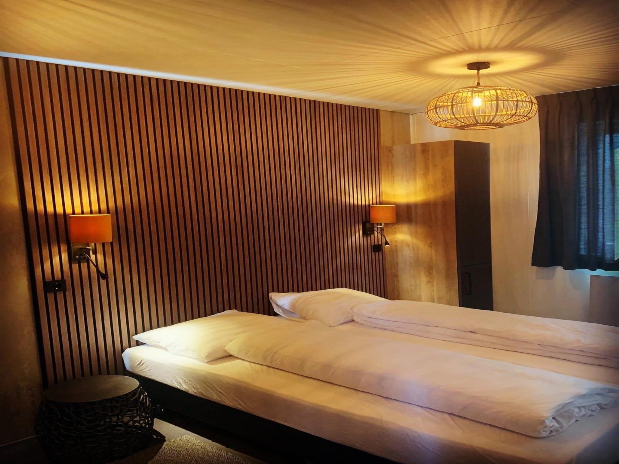 Een slaapkamer van Wellness lodge Grutto 2p in Dalerveen