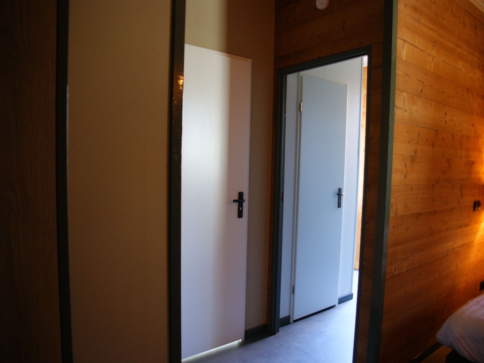 Een slaapkamer van Wellnesslodge Kievit 2p in Dalerveen