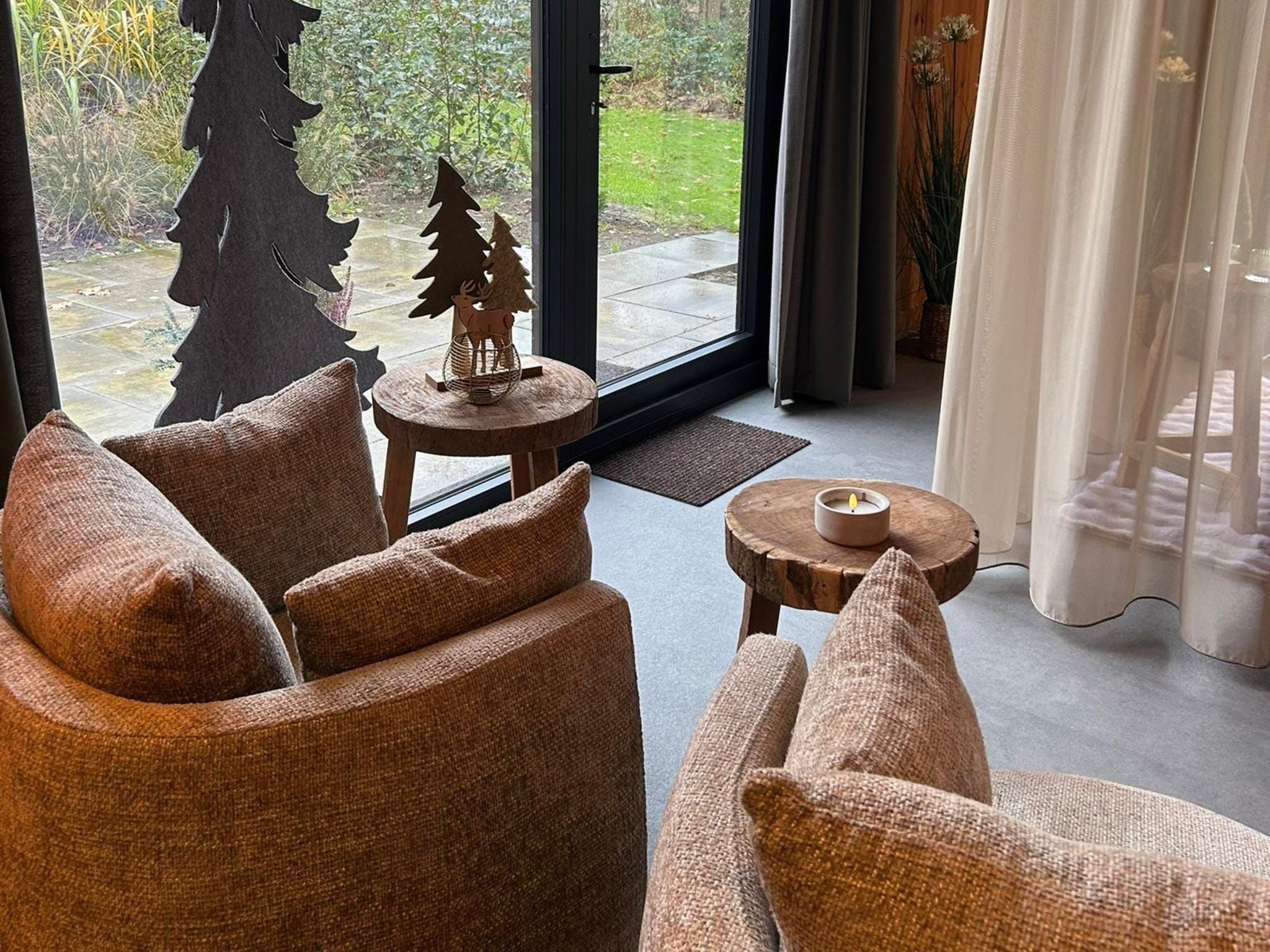 De woonkamer van Wellnesslodge Kievit 2p in Dalerveen
