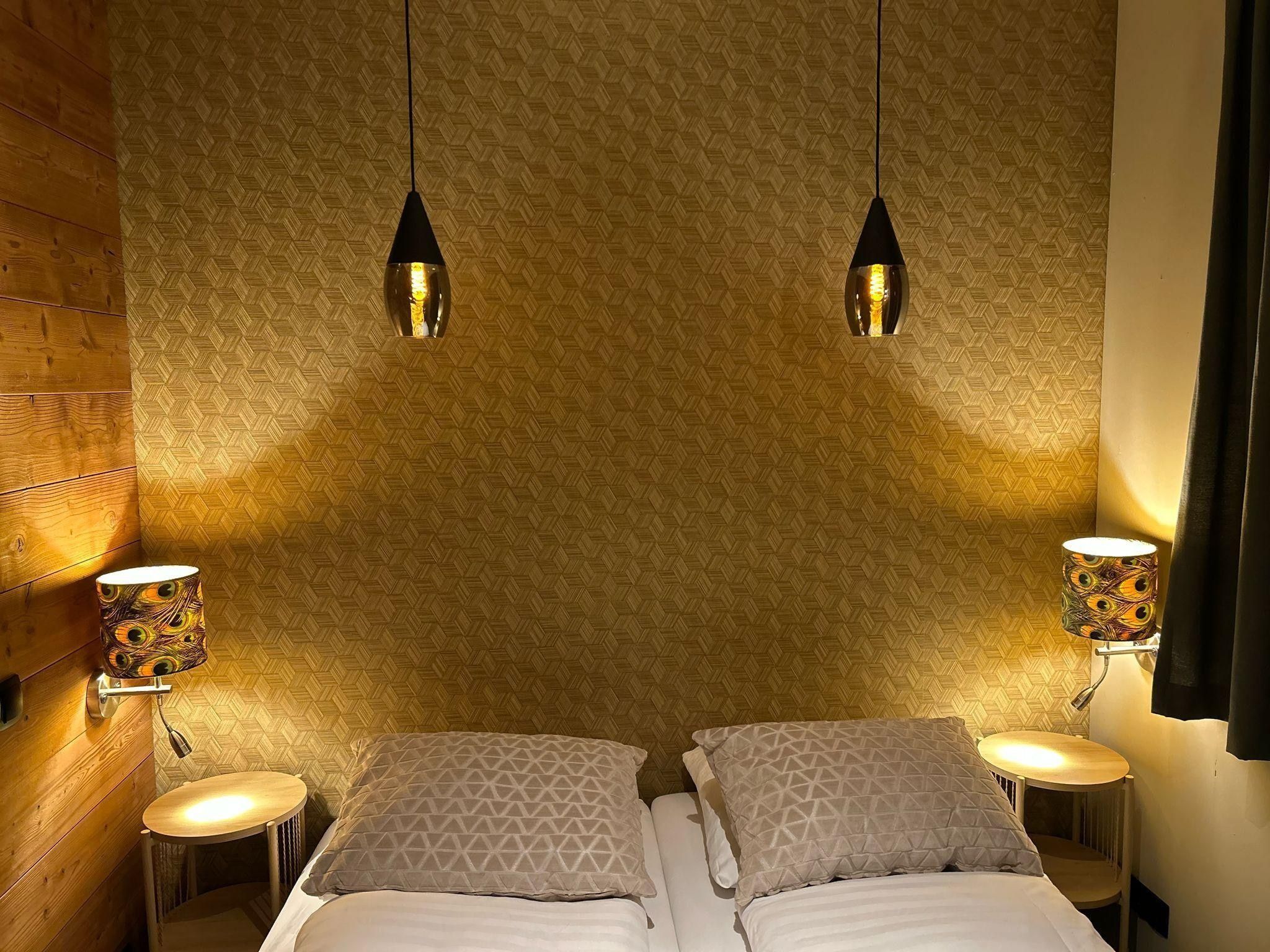 Een slaapkamer van Wellnesslodge Kievit 2p in Dalerveen