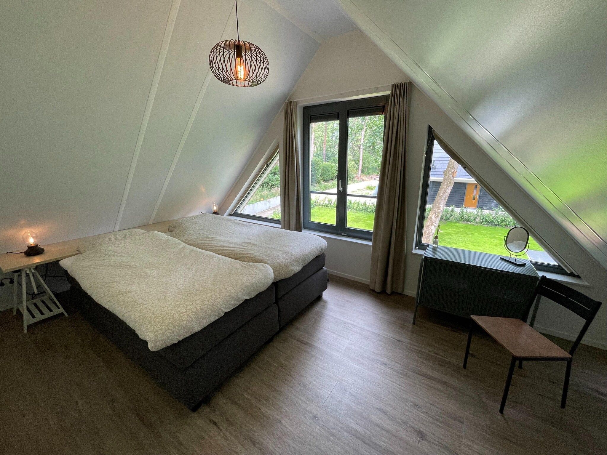 Een slaapkamer van Energievriendelijk 't Brummelhuus H556 in Lochem