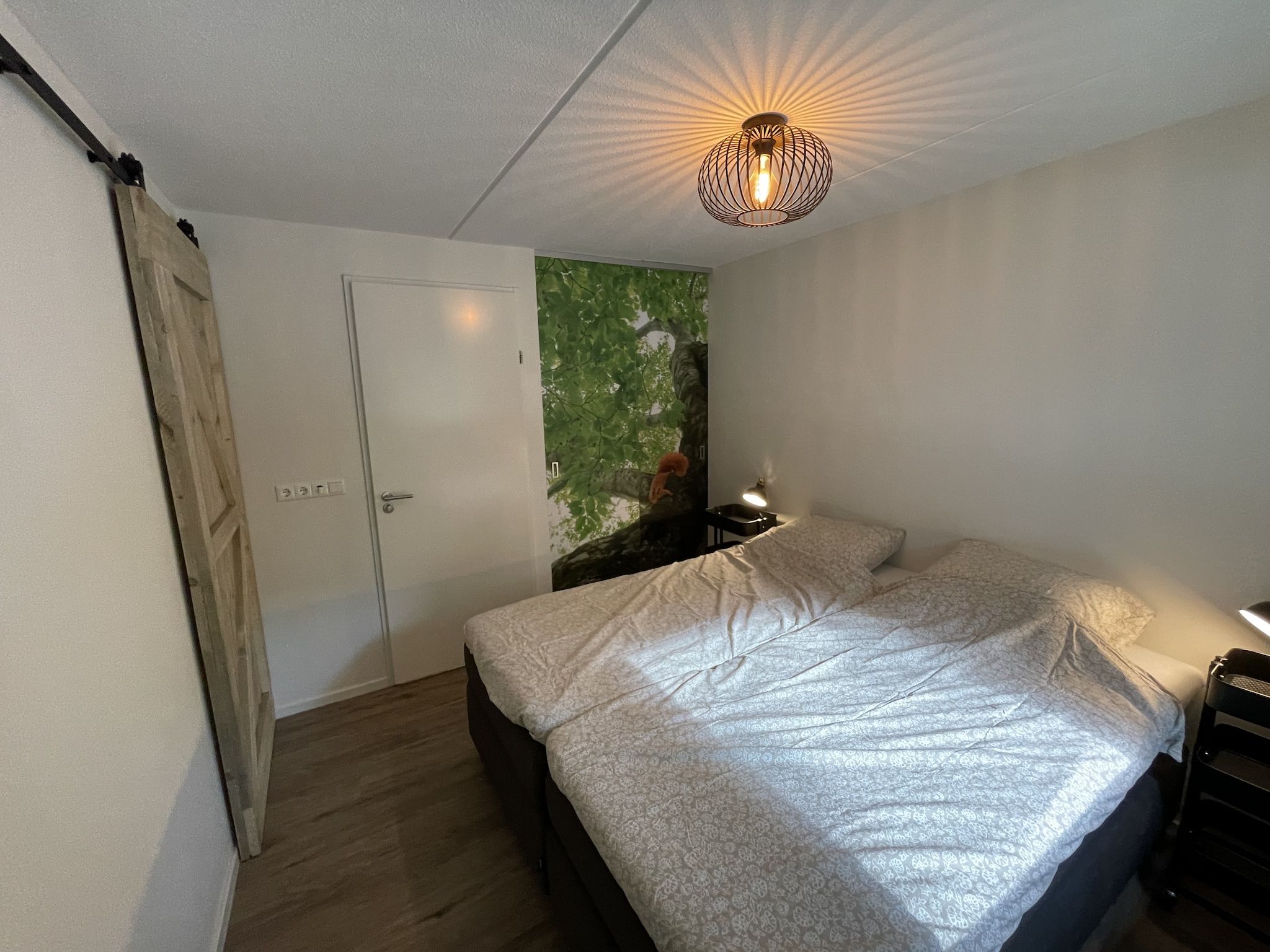 Een slaapkamer van Energievriendelijk 't Brummelhuus H556 in Lochem