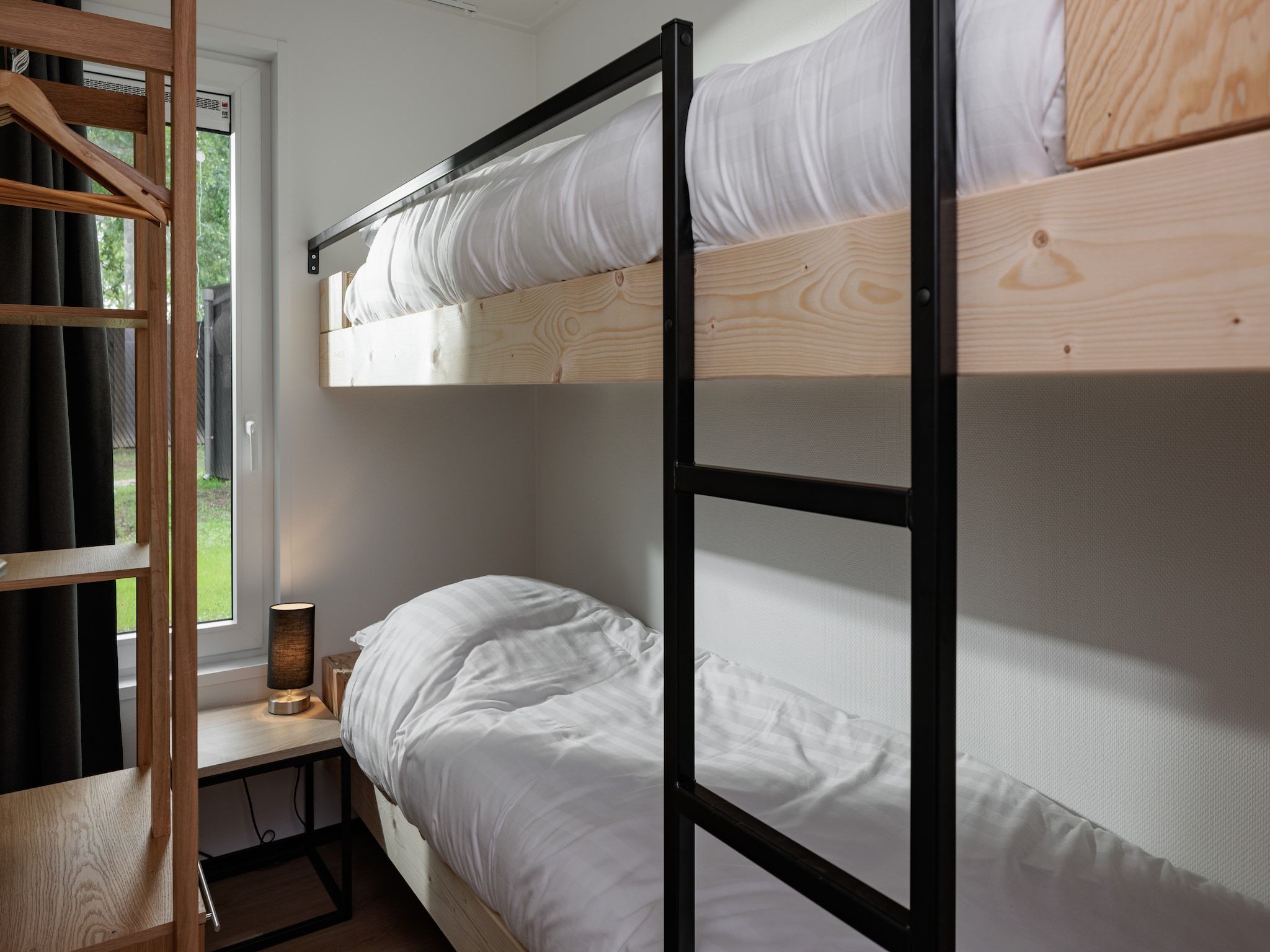 Een slaapkamer van Vakantiepark Schaijk 7 in Schaijk