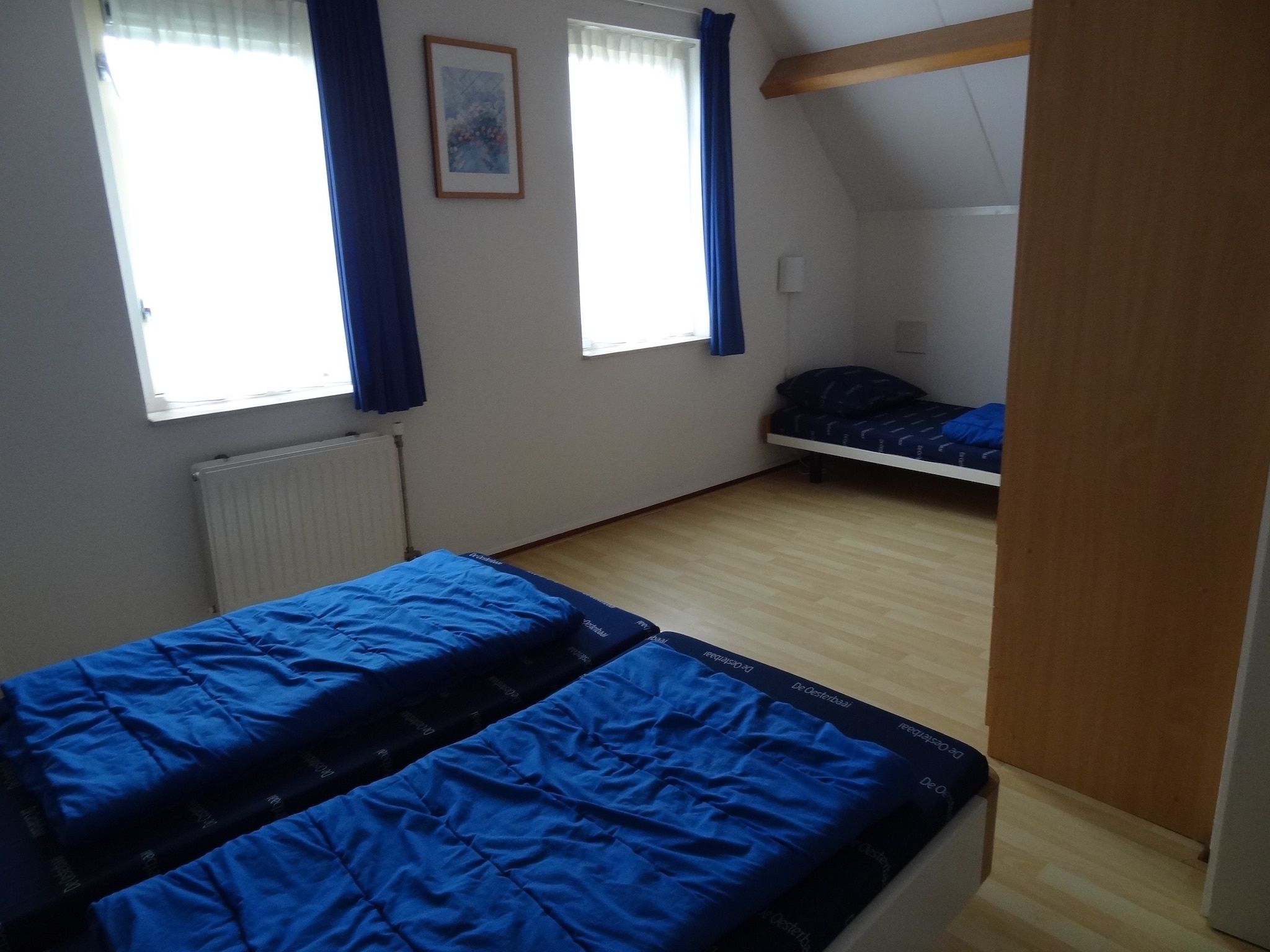 Een slaapkamer van Villapark De Oesterbaai 15 in Wemeldinge