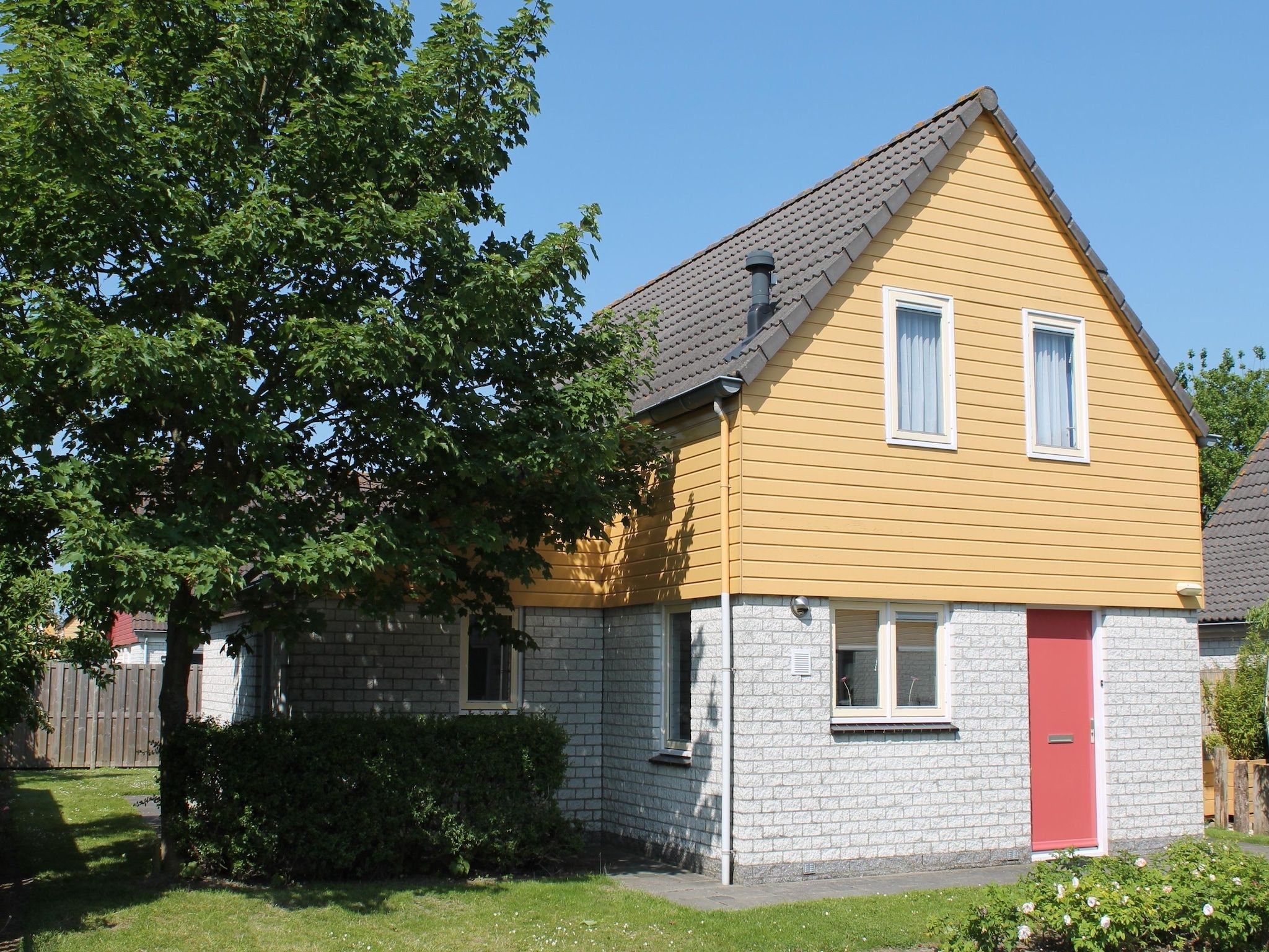 De buitenkant van Villapark De Oesterbaai 15 in Wemeldinge