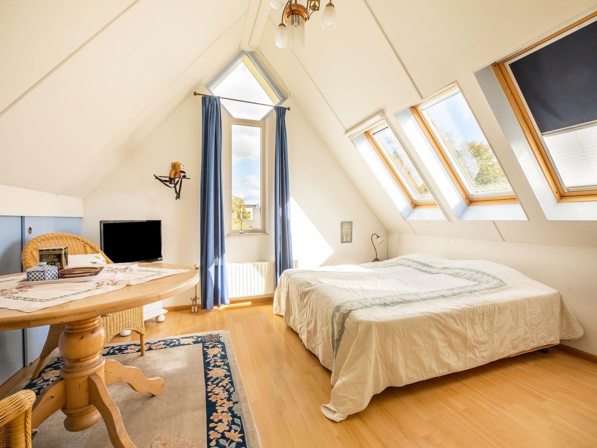 Een slaapkamer van Vakantiewoning Blauw in Hoorn