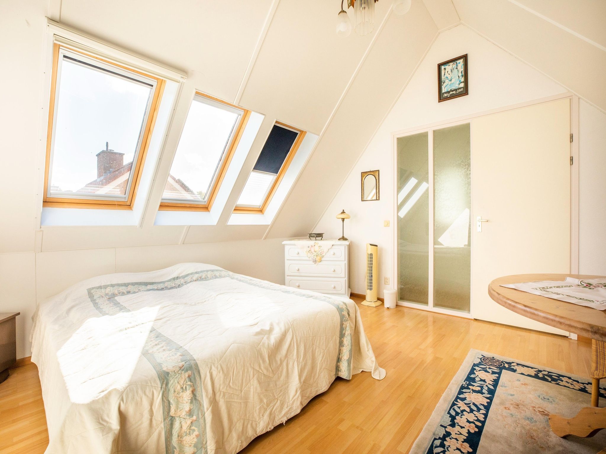 Een slaapkamer van Vakantiewoning Blauw in Hoorn