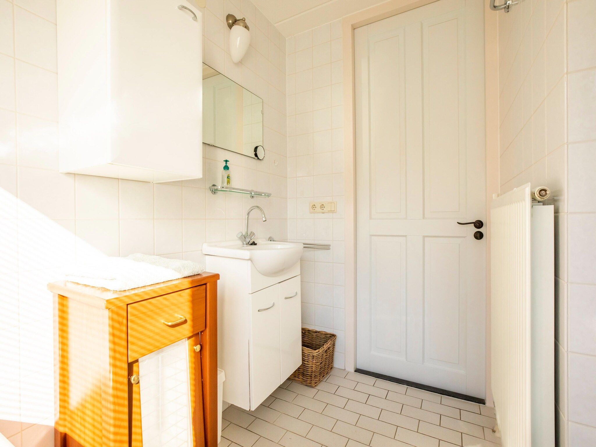 De badkamer van Vakantiewoning Blauw in Hoorn